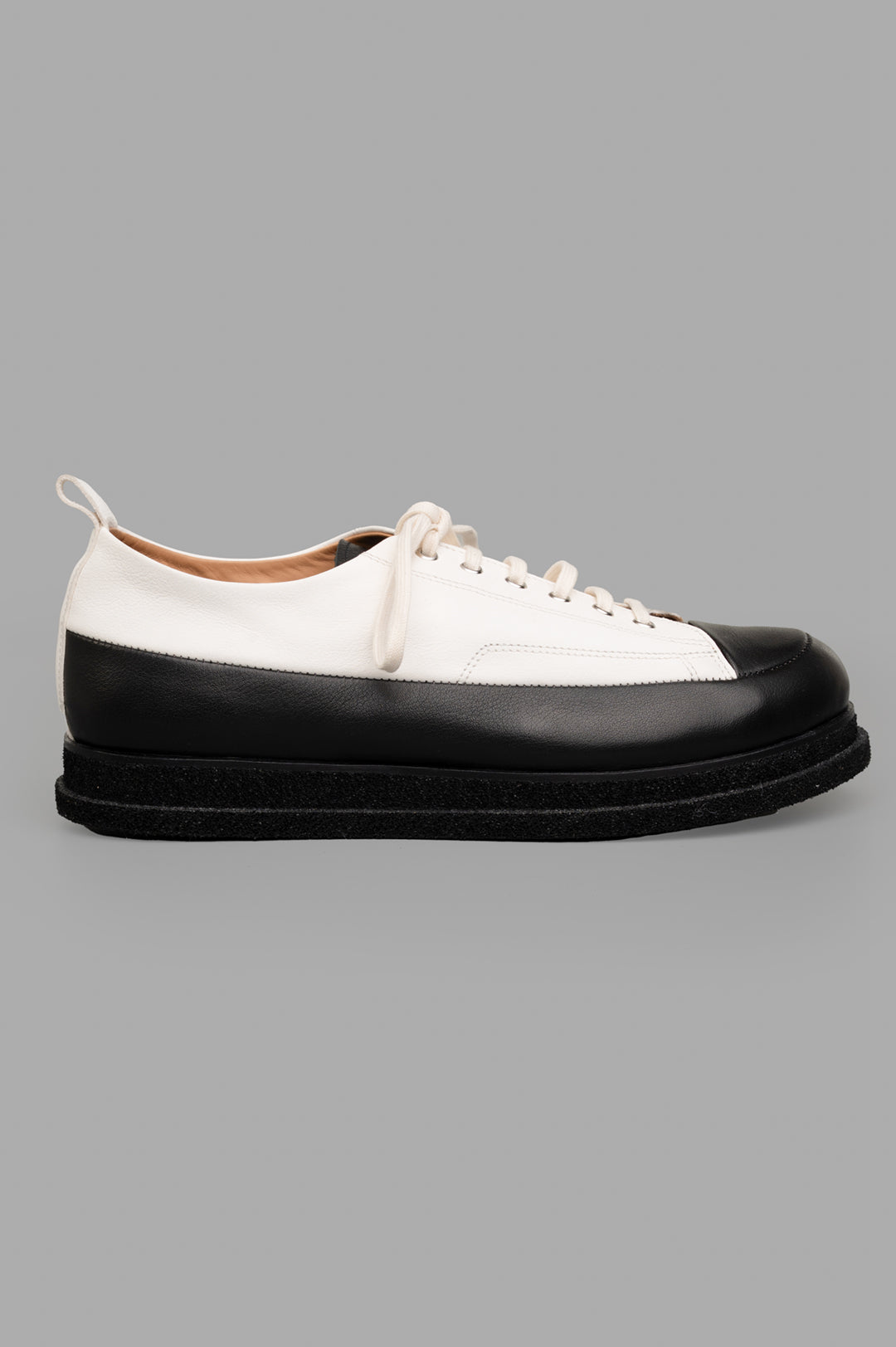 Shoto Color-block Shoes in white/black, side view. Handmade Italian leather with unique patina detail.