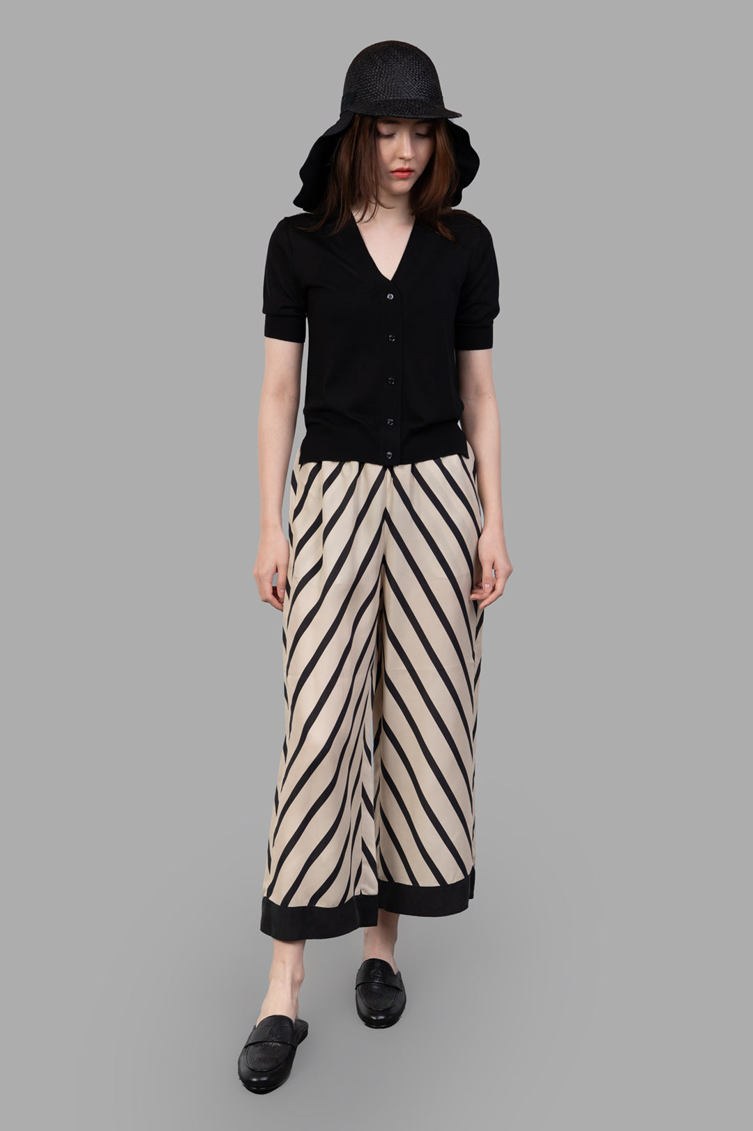 By Malene Birger Mirabello Wide-leg Trousers in ecru, shown with high elastic waistband and diagonal stripe pattern, on.