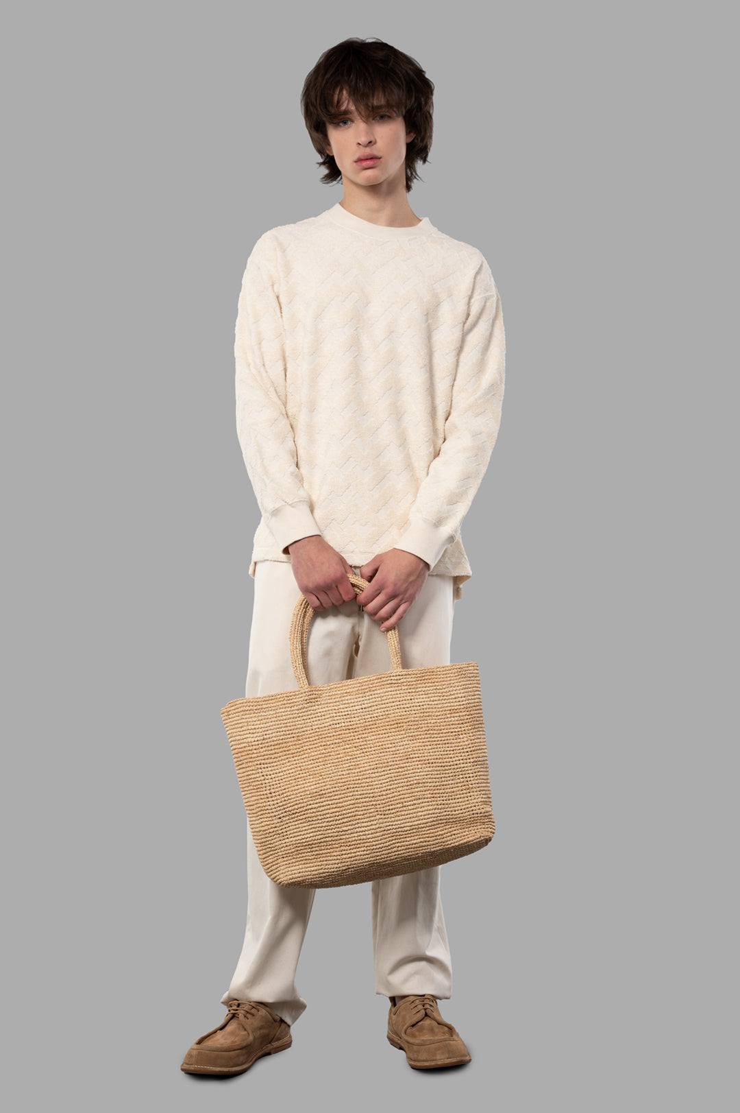 Comme des Garçons Terrycloth Sweater in ecru, front view. Features textured graphic print, rounded neckline, straight hem.