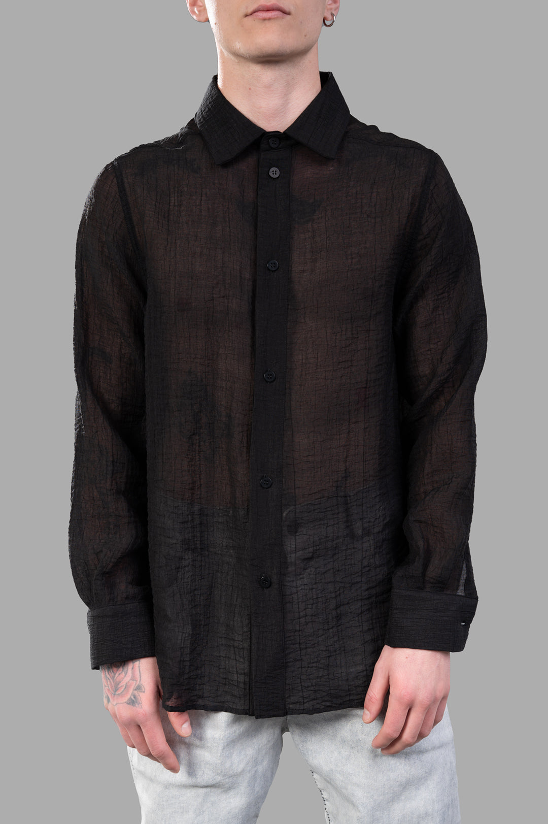 Justin Gall Crinkled Shirt in black, showcasing a relaxed-fit silhouette and unique semi-transparent texture.