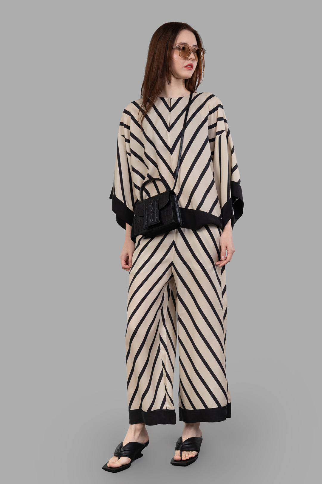 By Malene Birger Cicie Striped Blouse, on-model, ecru/black, V-neck, cropped sleeves, elegant evening wear.