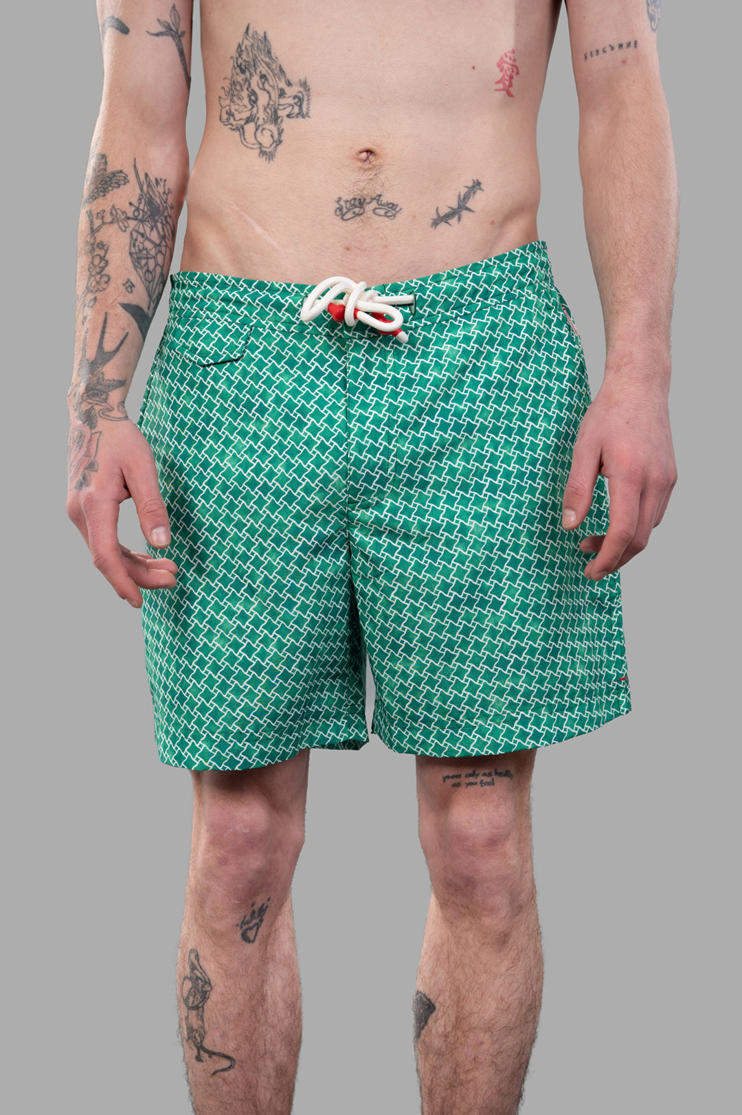 Orlebar Brown Drawcord Swim Shorts in Green, showcasing a relaxed fit with half-elasticated waistband and drawcord detail.