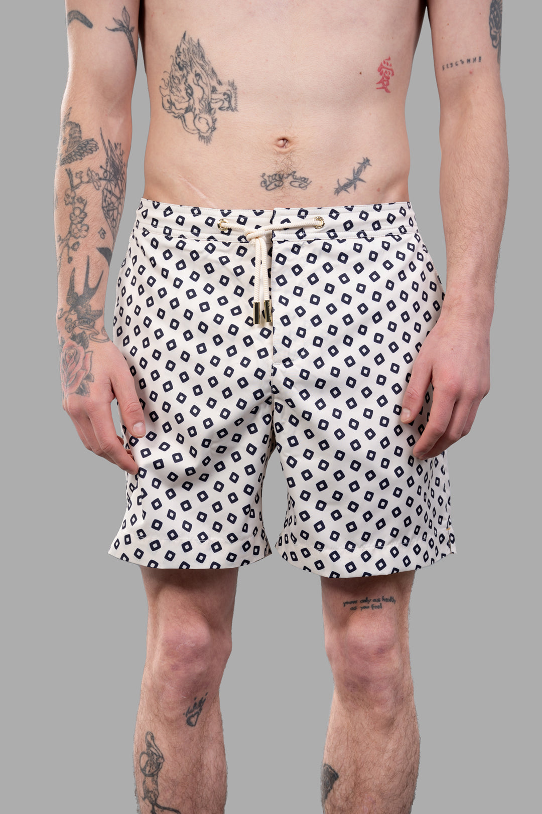 Orlebar Brown Bulldog Drawcord Swim Shorts, front view on model showcasing nautical pattern and adjustable drawcord.