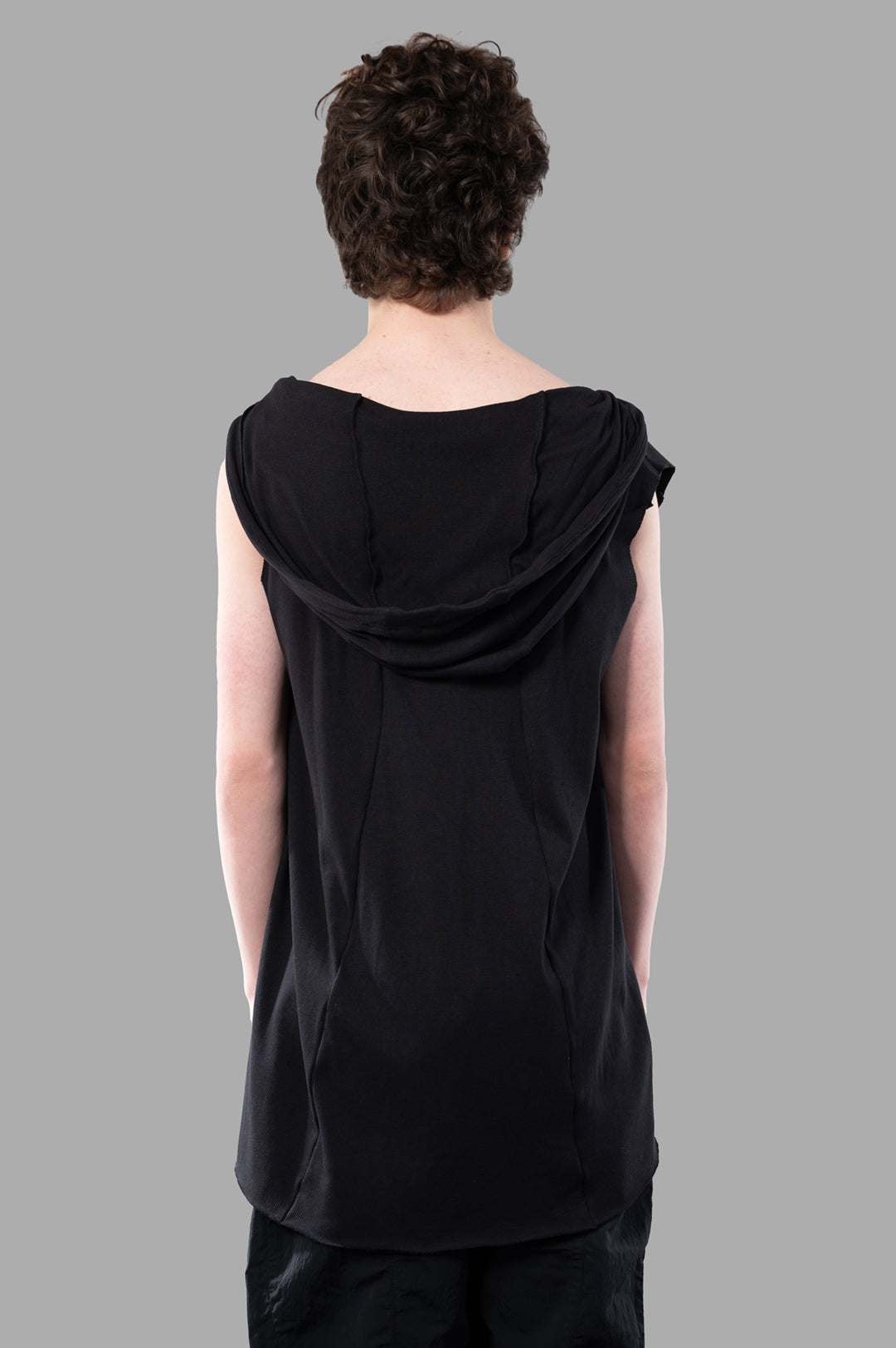Justin Gall Light Rib Hooded Cutoff displayed from the back, featuring a soft black bamboo-blended fabric and relaxed hood.