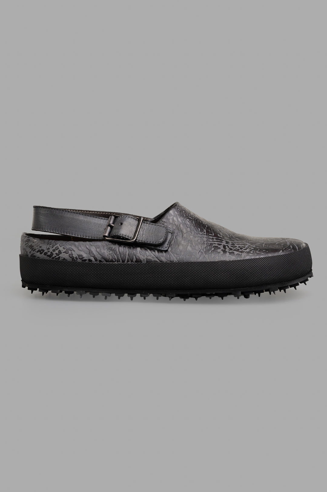 Shoto Slip-on Mules in black leather, side view showcasing textured artisanal finish and unique patina.