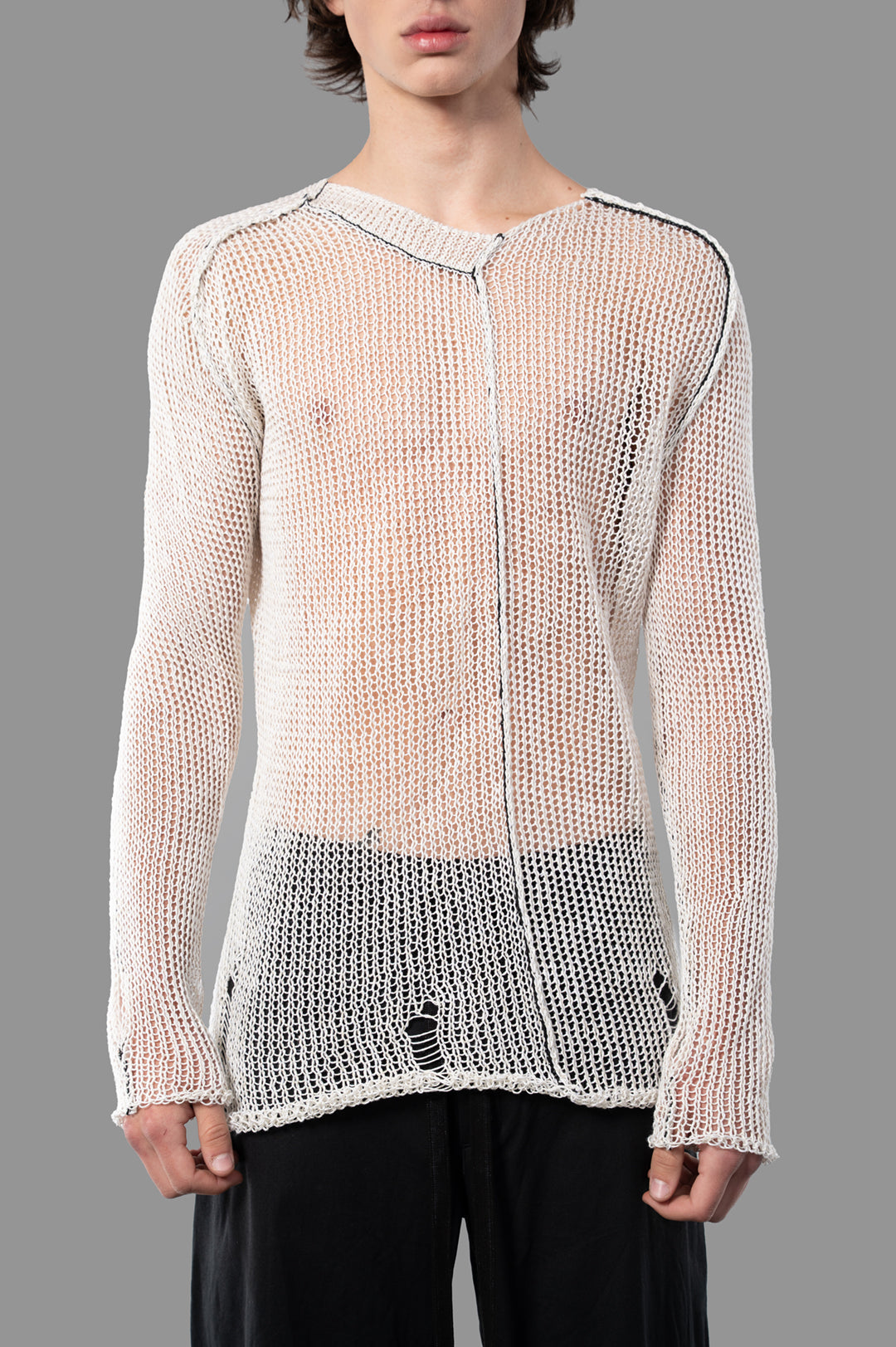 Masnada White Mesh Sweater displayed on model, featuring a unique see-through design in ecru linen. Ideal for a cool, edgy.