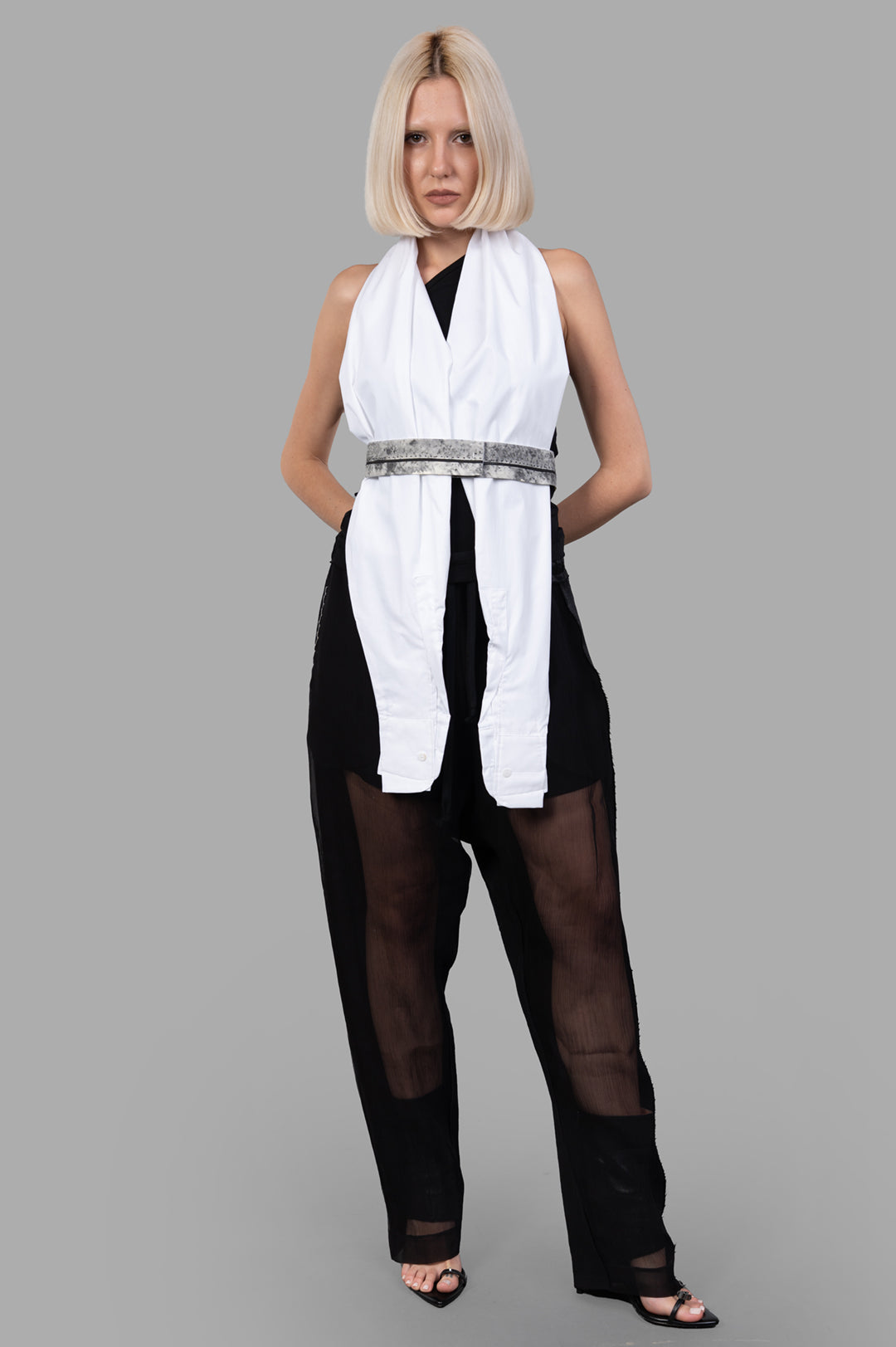 Giovanni Cavagna white Sleeve Top worn as elegant scarf, front view on model, showcasing innovative fashion design.
