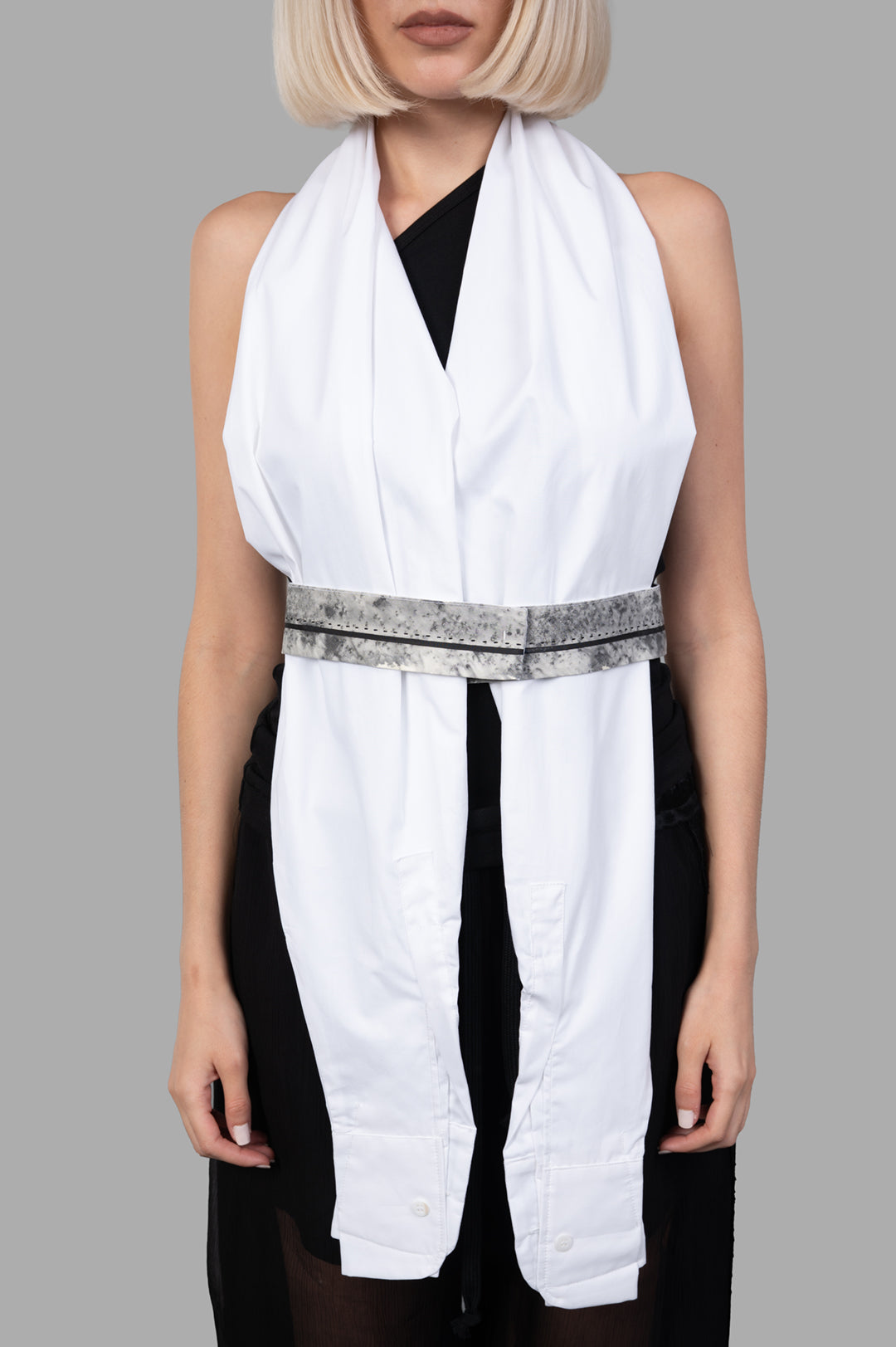 Giovanni Cavagna Sleeve Top features a white design on-model, doubled as an elegant scarf with a unique belt detail.