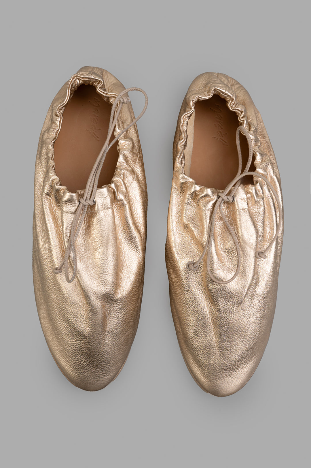 Marsèll Drawstring Shoes in gold, featuring a unique, artisanal design with soft leather texture and elasticized openings.