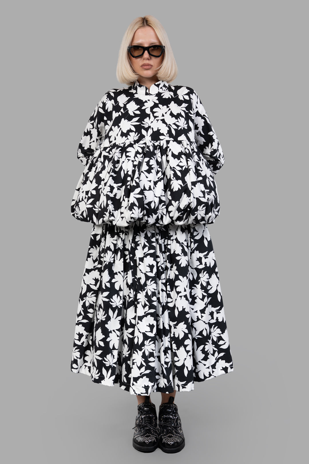 Comme des Garçons Floral-print Pleated Jacket, front view on-model, black/white, featuring stand collar and loose fit.