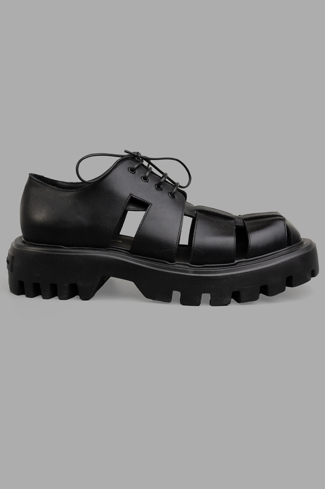 Mattia Capezzani Iron Black Shoes side view, featuring sculptural cut-out design and chunky sole in 100% leather.