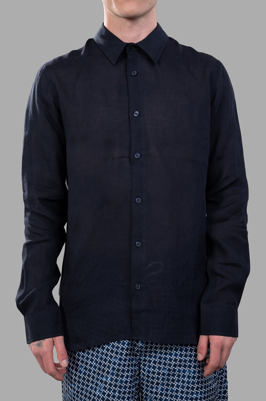 Orlebar Brown Linen Shirt in navy blue, featuring a structured fit, modern design, and button details, showcased on model.