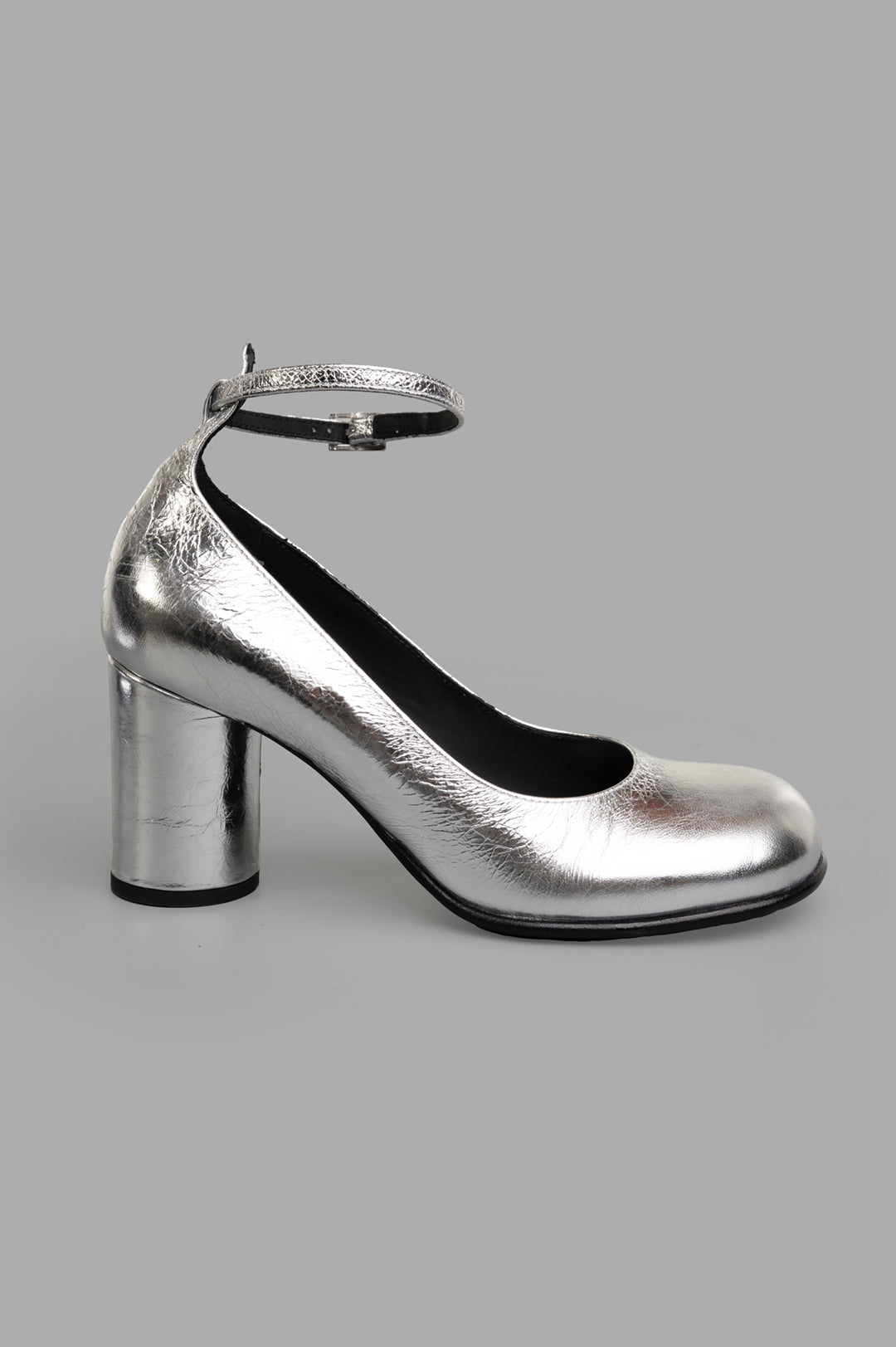 Mattia Capezzani Silver Heels side view showcasing metallic leather and thick block heel, handcrafted Italian elegance.