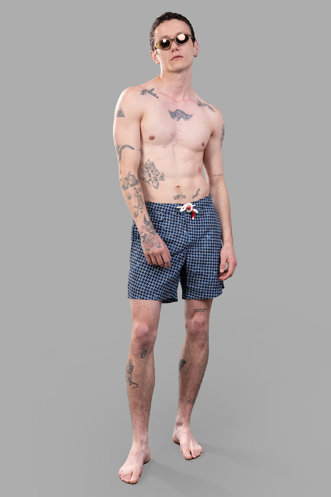 Orlebar Brown Geo Print Drawcord Swim Shorts in blue, on-model front view, featuring relaxed waistband and drawcord.