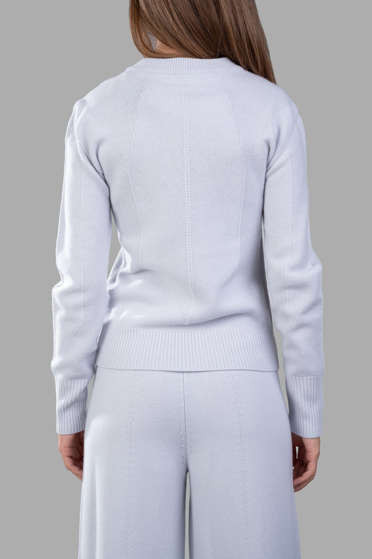 Joseph Soft Wool Jumper in light grey, featuring a ribbed hem and back detail, showcasing its pure merino wool texture.