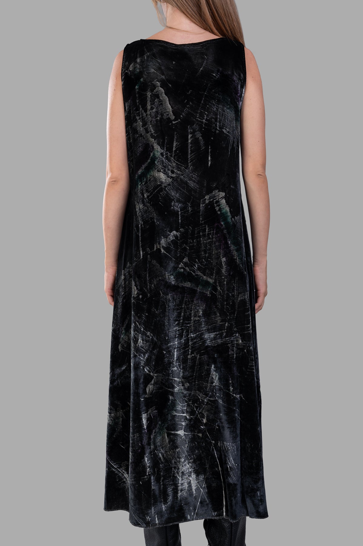 Avant Toi Velvet Maxi Dress showcased from the back, highlighting luxurious black velvet fabric with a unique print.