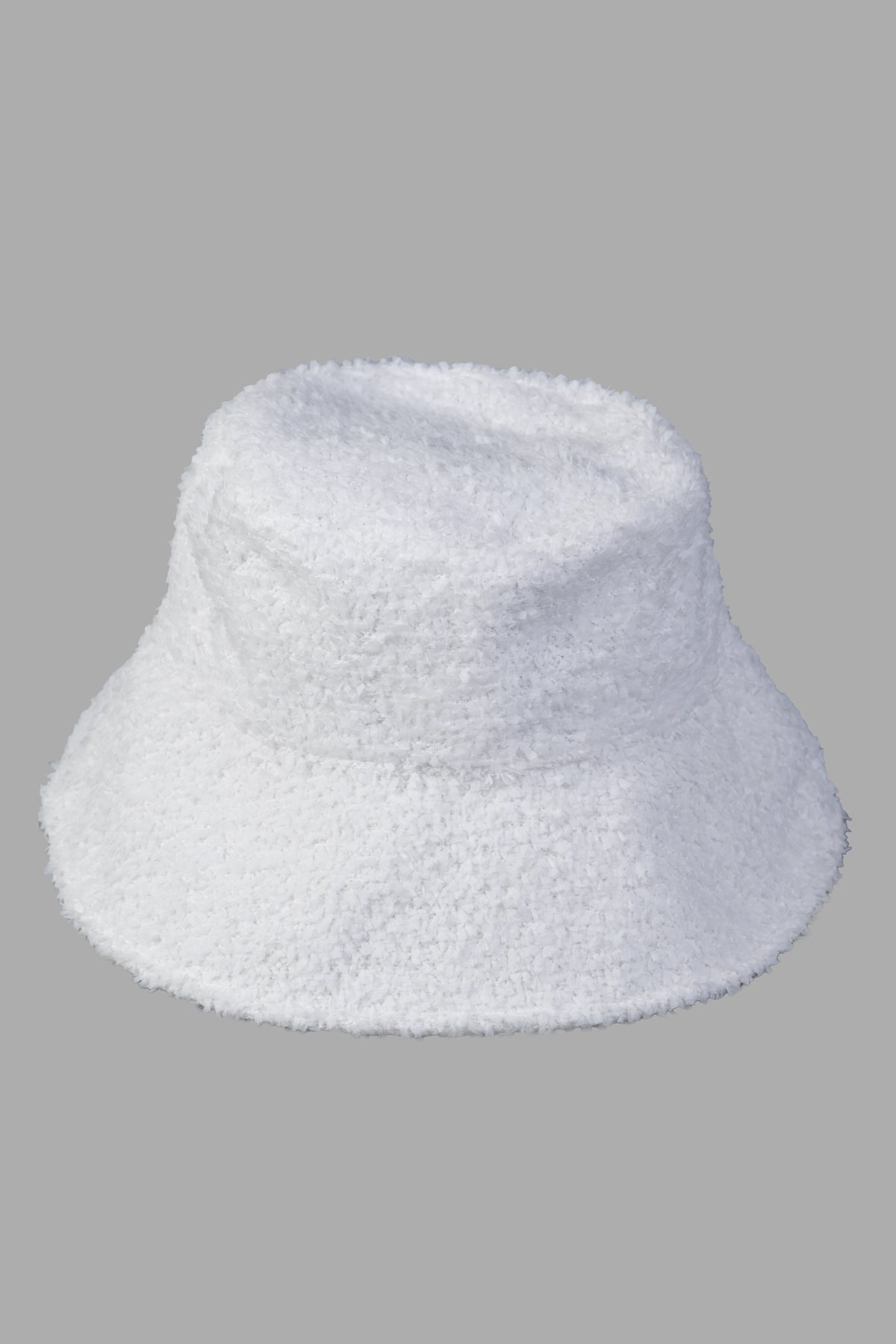 MSGM White Bucket Hat, front view showing textured fabric detail, perfect for sunny day styling.