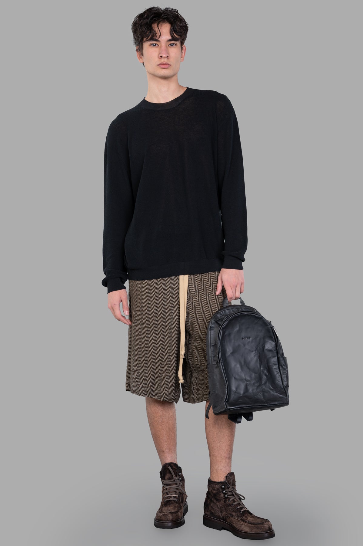 Uma Wang Fine-knit Sweater in black, on-model front view with round neck, showing relaxed fit and straight hemline.