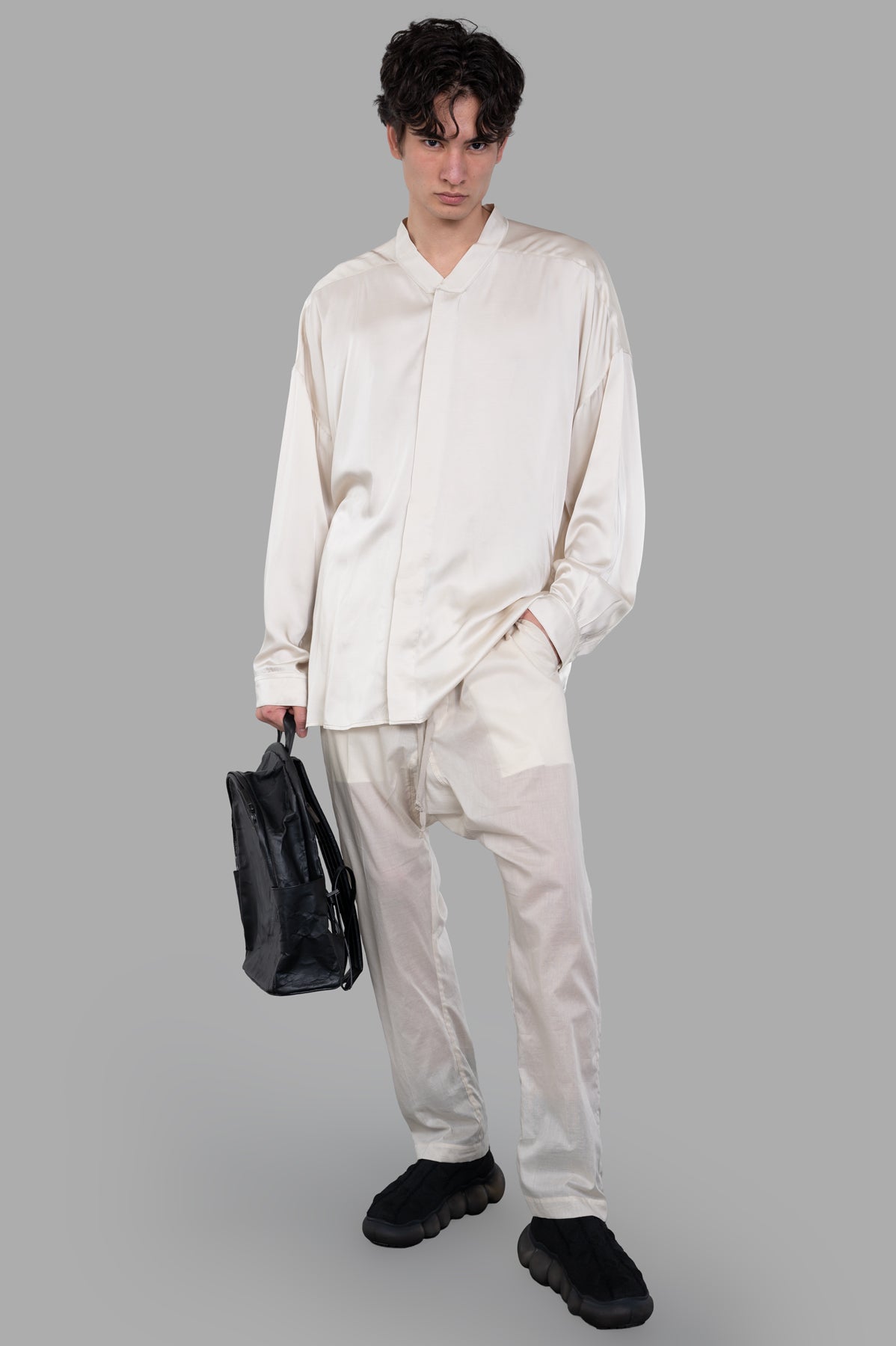 Rick Owens Semi-sheer Drawstring Pants in ecru shown on model, featuring a dropped crotch and elastic waistband.