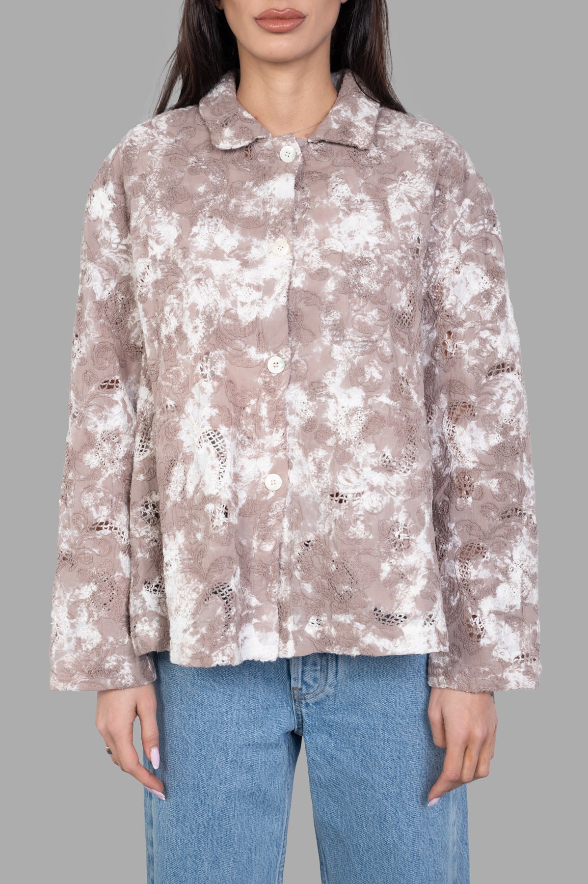 Avant Toi Tie Dye Cotton Jacket in beige, featuring unique patterns and relaxed fit, displayed from a side angle.