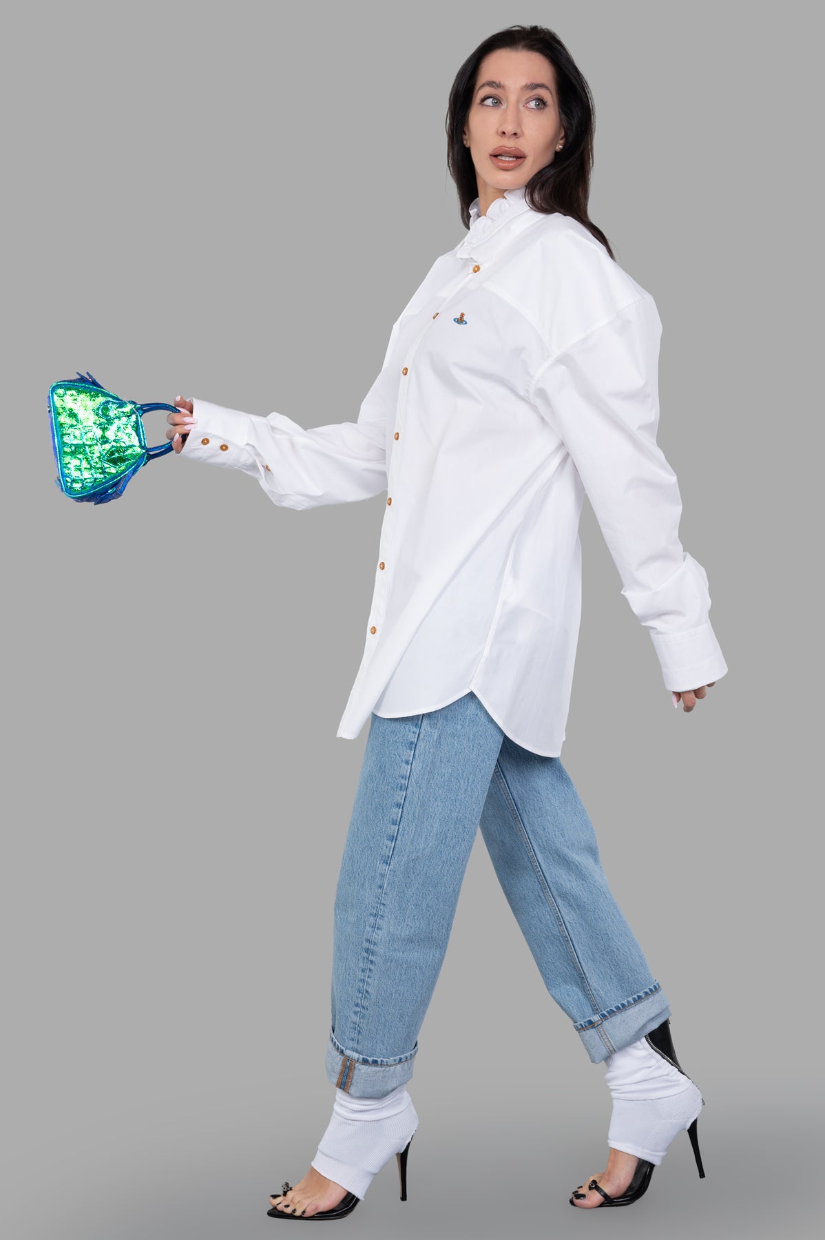 Vivienne Westwood Ruffled-collar Shirt in white, showcased on-model with gold buttons, paired with jeans and heels.