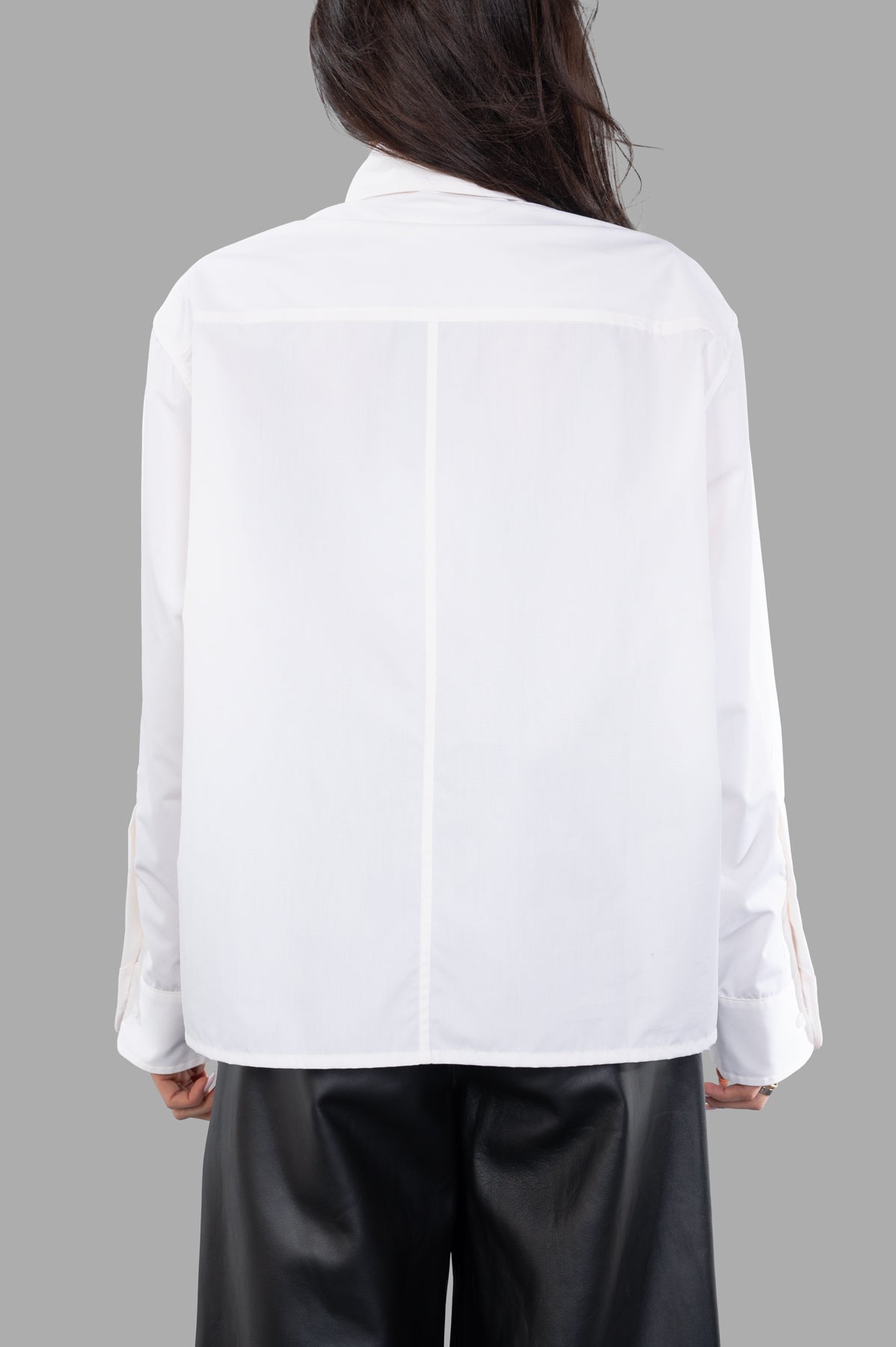 DES PHEMMES Bedazzled Shirt, featuring a classic white design shown from the back on a model, with stylish detailing.
