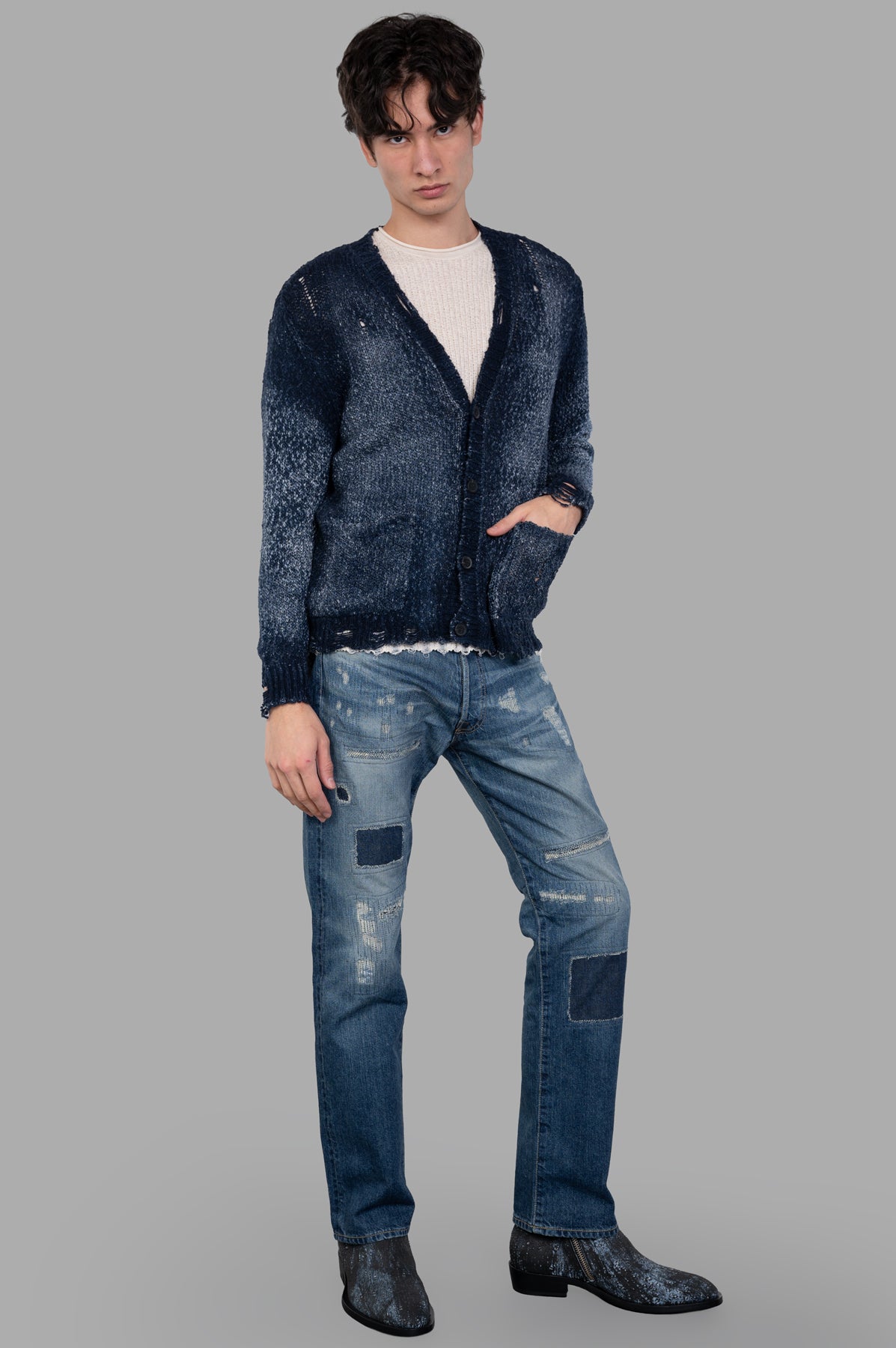 Avant Toi Distressed V-neck Cardigan in blue, faded effect, front view on model, vintage style.