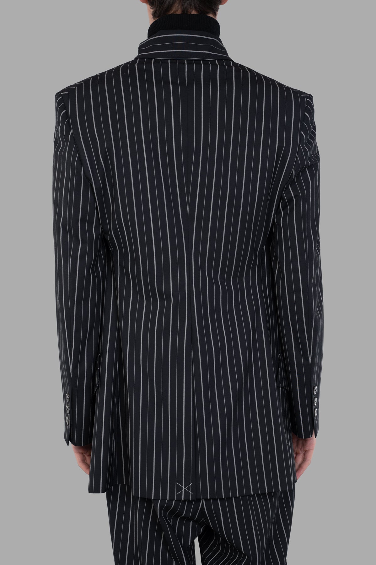 Vivienne Westwood DL Pinstripe Jacket shown from the back, featuring a classic pinstripe pattern and elegant lapel design.