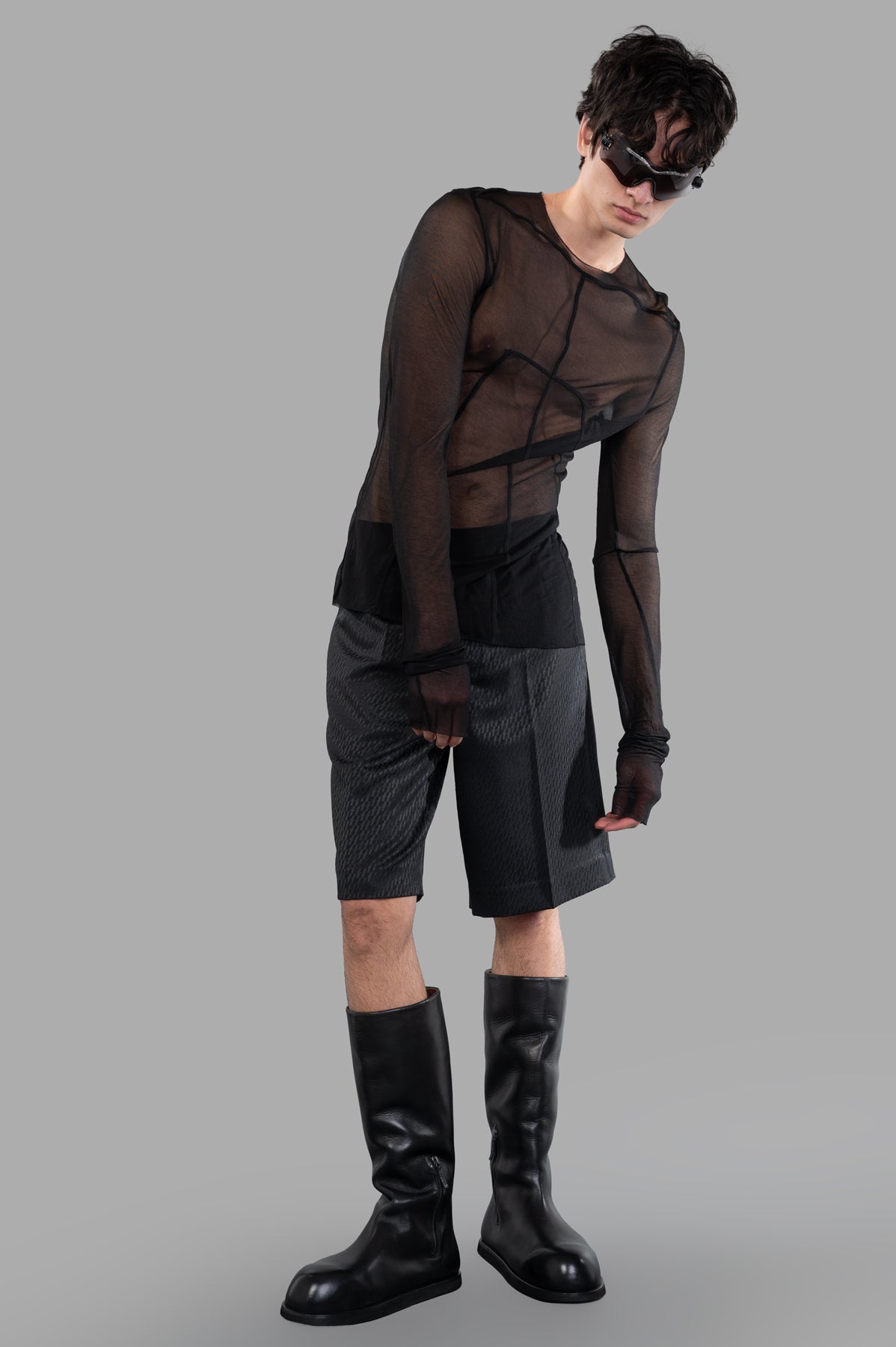 Rick Owens Edfu Sheer Top in black, front view on-model, showcasing skin-tight fit and signature seam design.