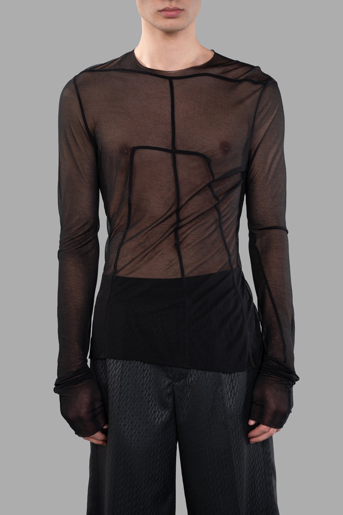 Rick Owens Edfu Sheer Top in black, showcasing a hip-length, skin-tight fit with a round neck and intricate seam details.