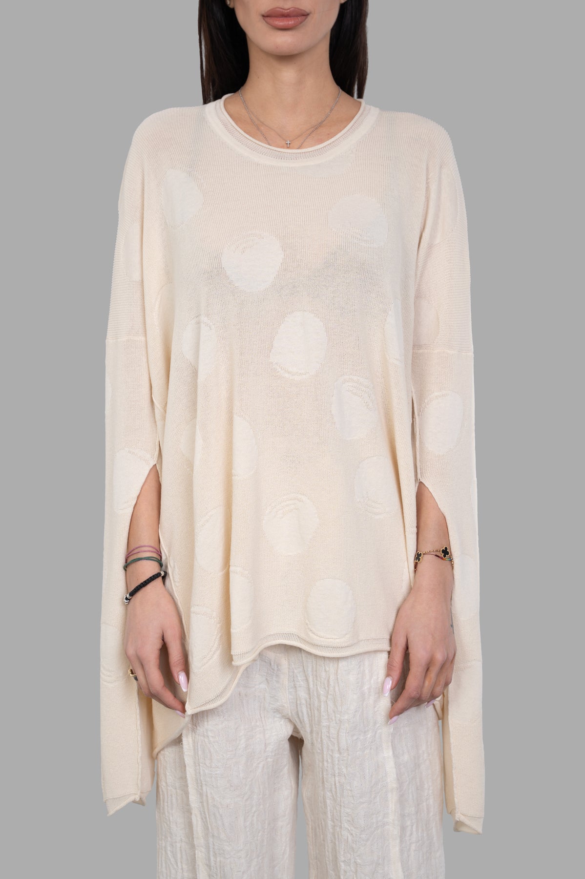Uma Wang Gothic-sleeve Sweater in ivory with ribbed crewneck, dropped shoulders, and polka dot detail, on-model front view.