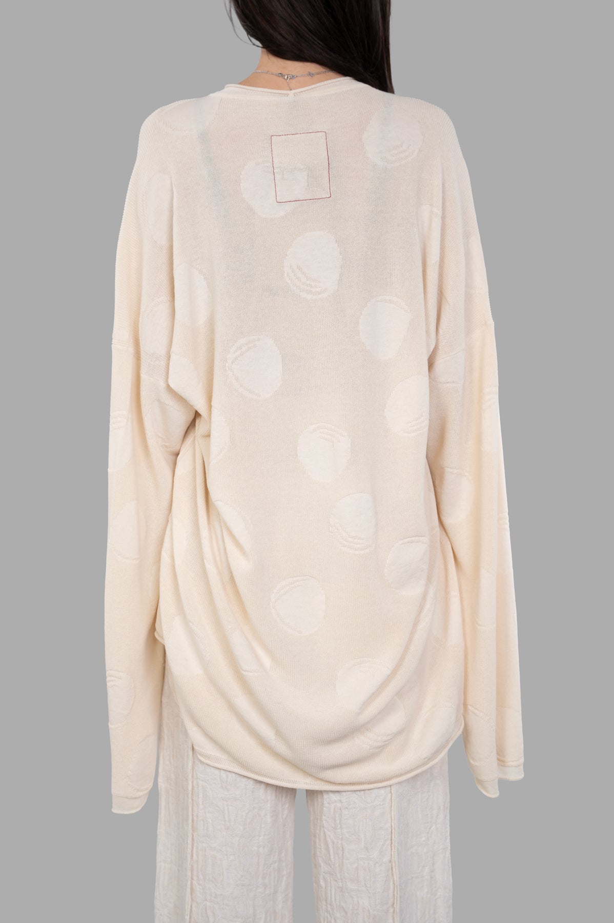 Uma Wang Gothic-sleeve Sweater in ivory, showing the back design with maxi polka dots and dropped shoulders for comfort.