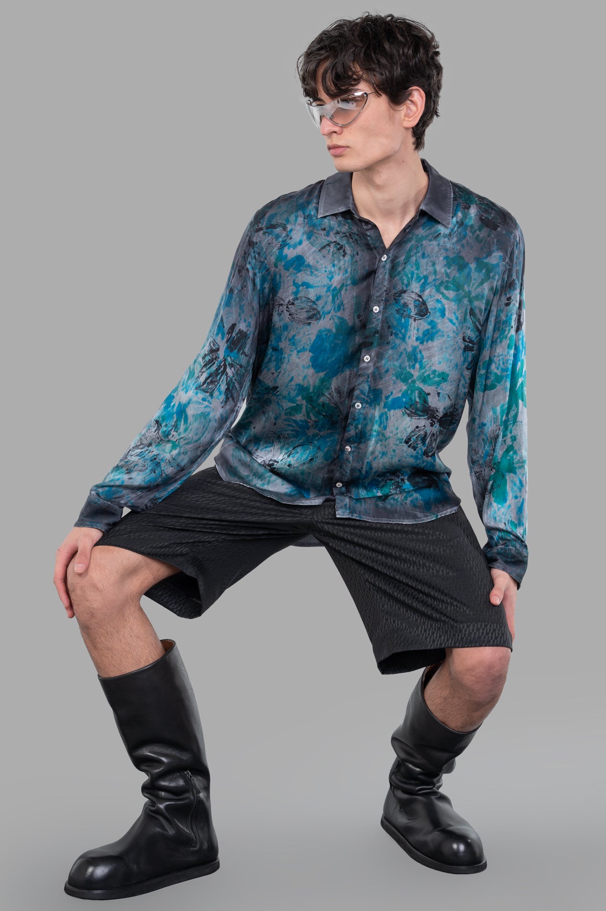 Avant Toi Abstract-print Shirt, front view on model, with blue and gray tones, styled with shorts and boots.