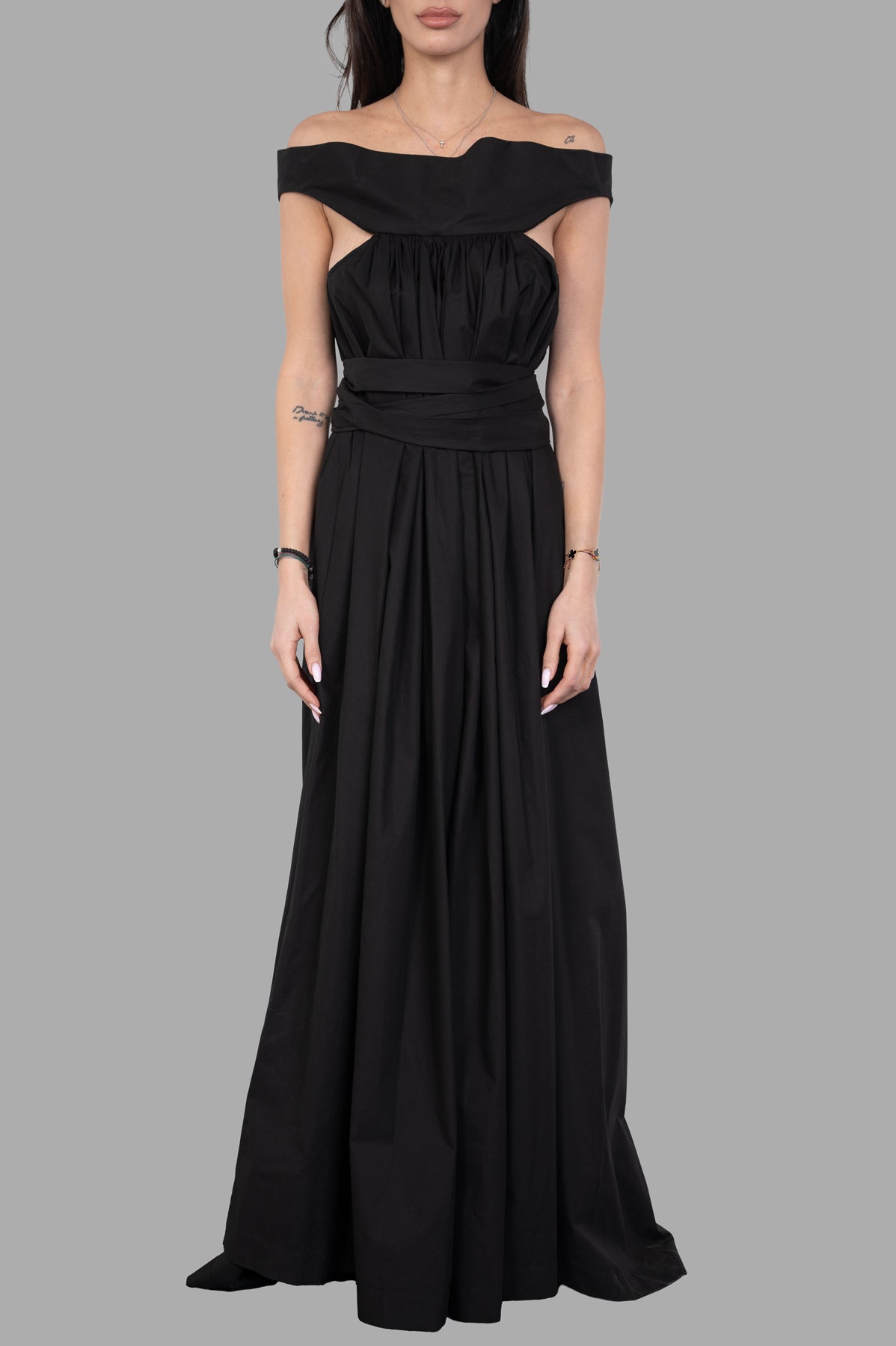 Rick Owens Hollywood Chalice Gown, ankle-length front, floor-length back, with wide collar, flared body, and side pockets.