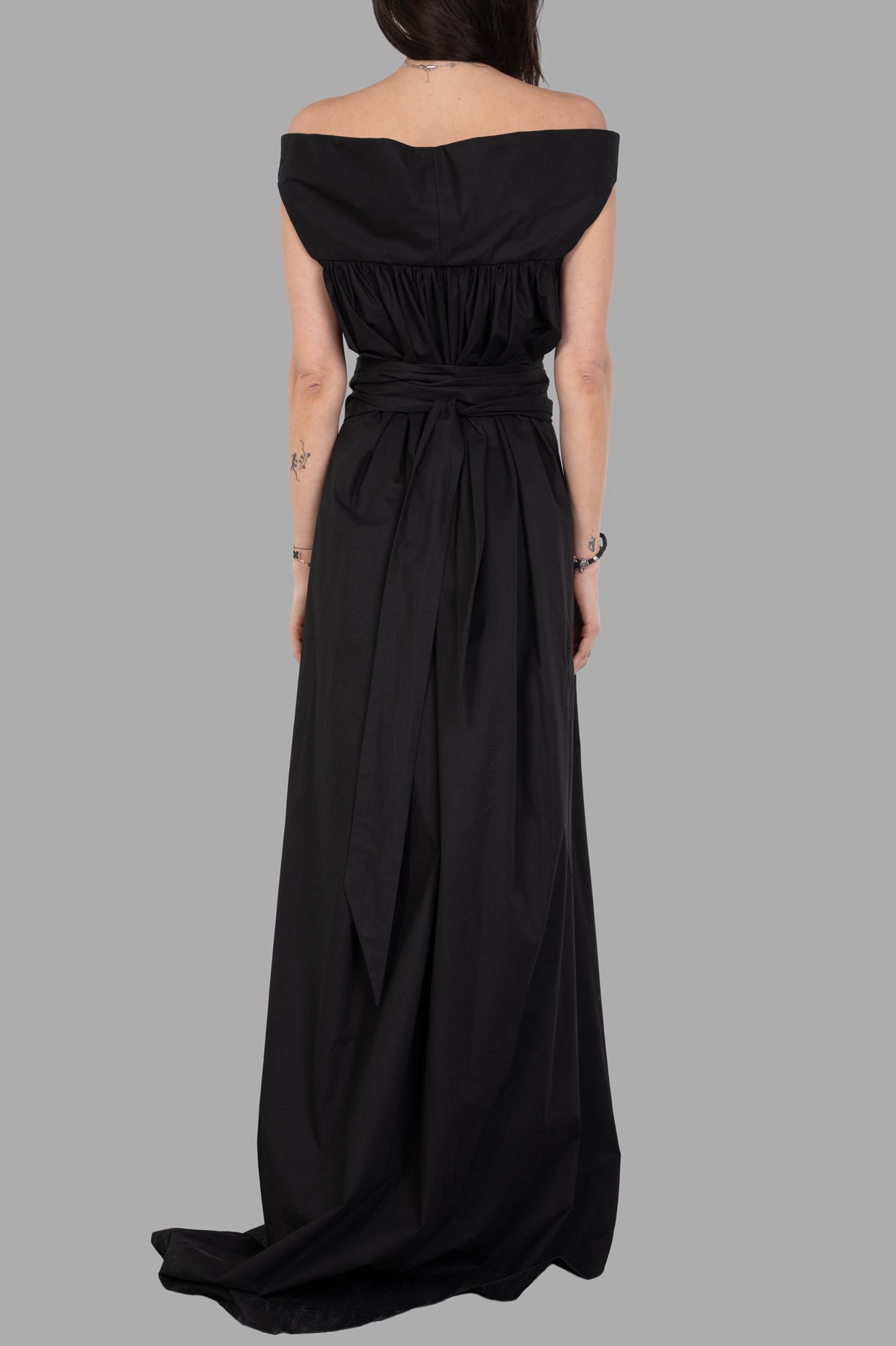 Rick Owens Hollywood Chalice Gown shows a back view with a wide collar, gathered bodice, and trailing floor-length hem.