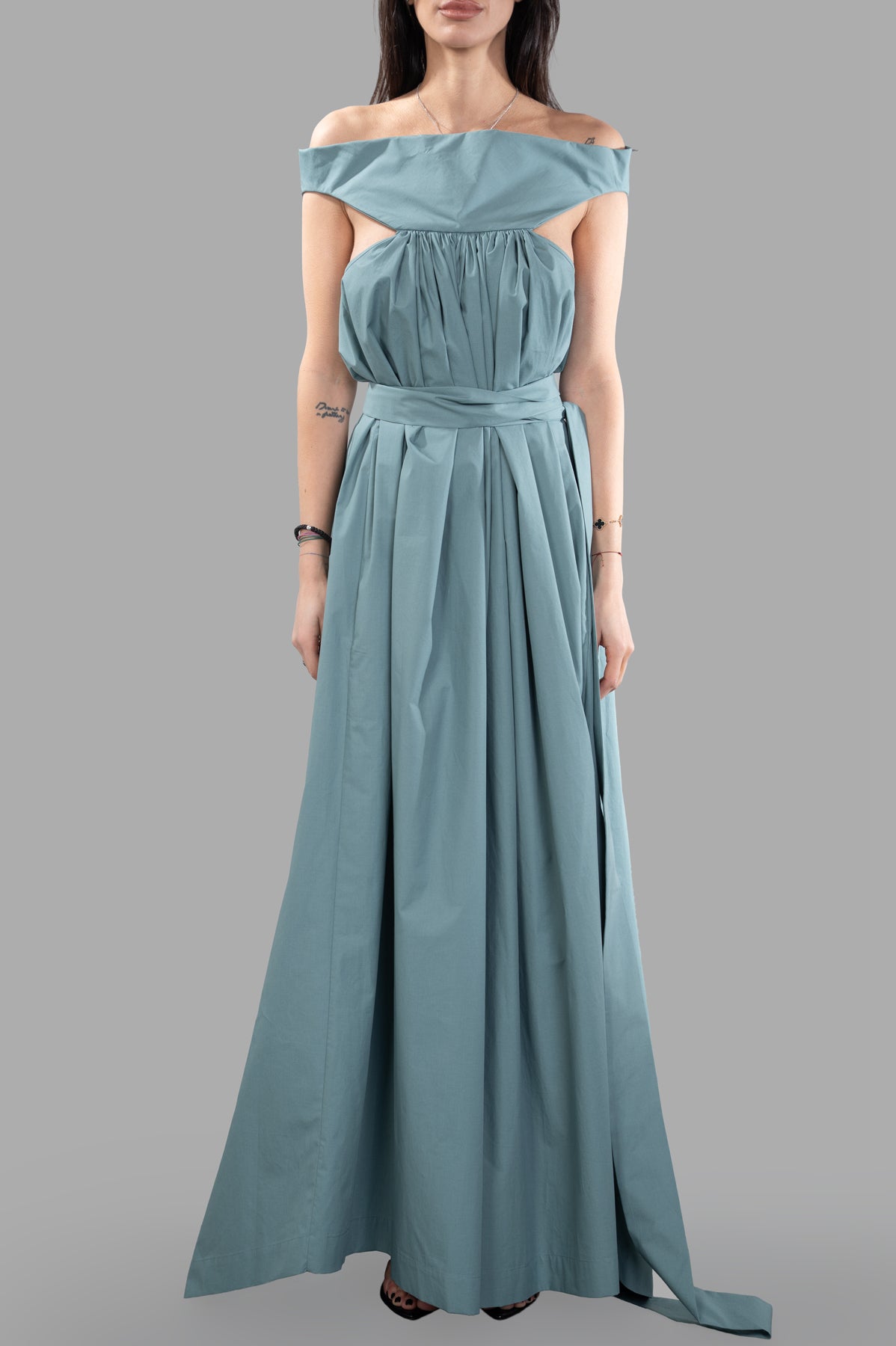 Rick Owens Hollywood Chalice Gown in green, showcasing off-shoulder design and voluminous skirt with side pockets.