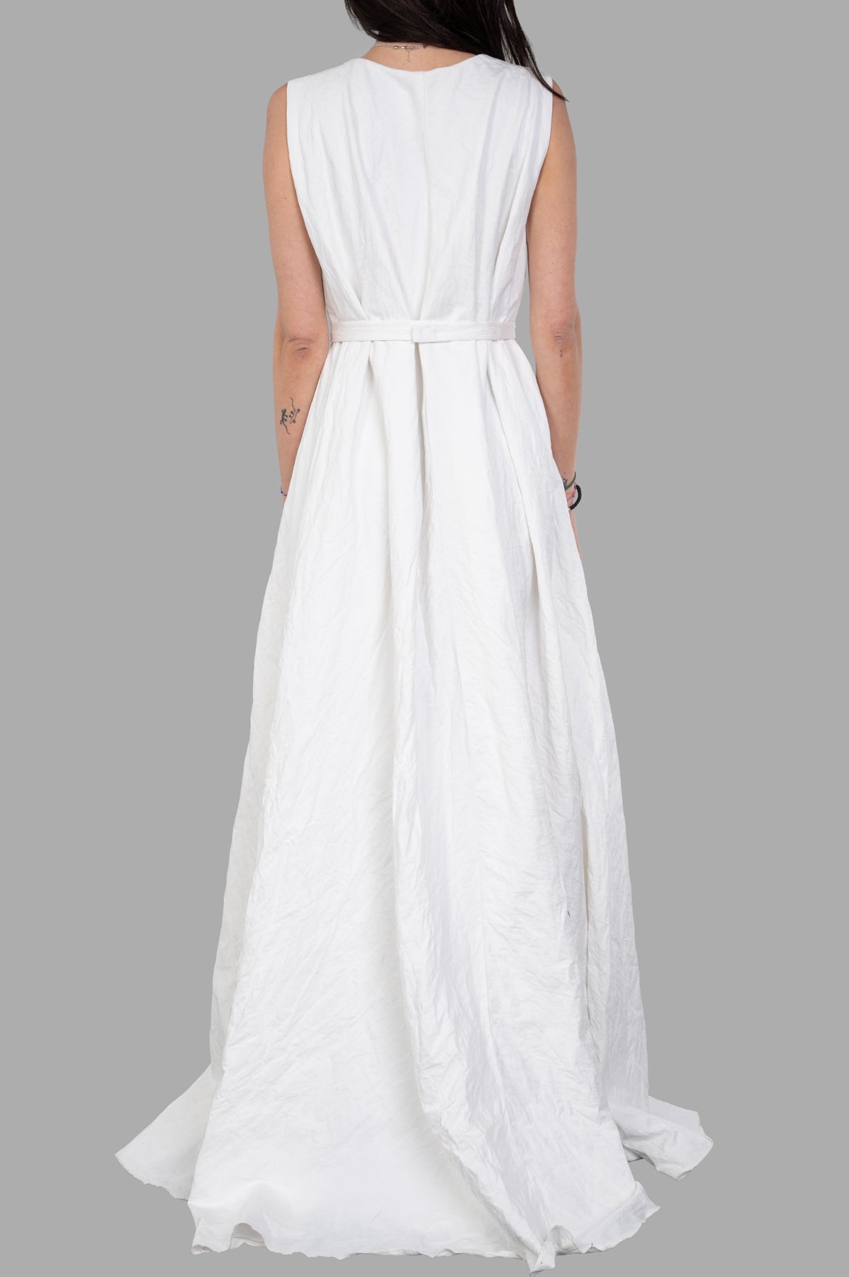 Marc Point Crinkled Dress, showcasing a belted waist and flowing fabric, captured from the back in elegant white.