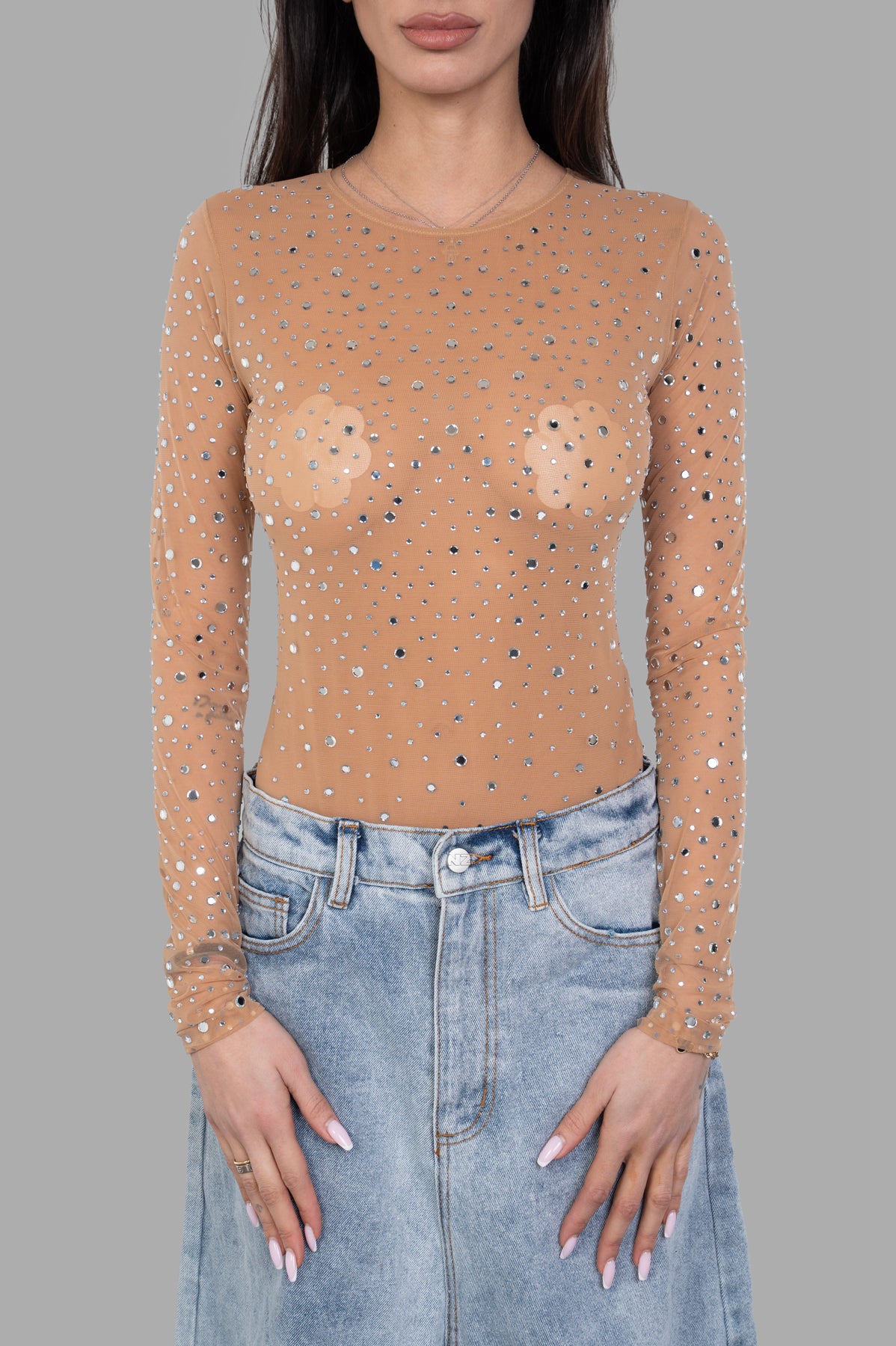 DES PHEMMES Crystal-embellished Body in beige, featuring a sheer, long-sleeved design with sparkling crystals, on model.