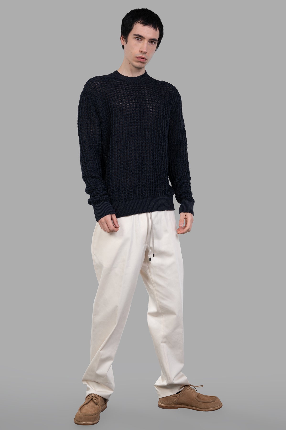 AION ecru cotton drawstring pants, straight-leg, elastic waist, on-model front view, versatile and chic look.