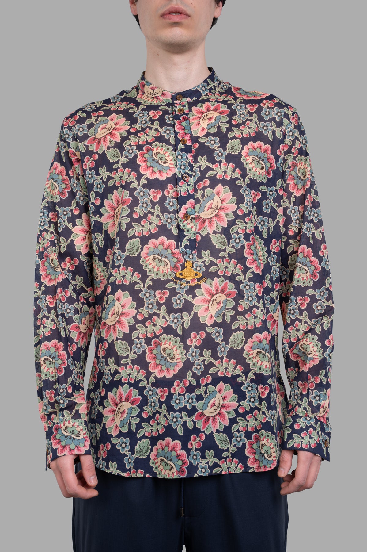 Vivienne Westwood Floral Mandarin Shirt featuring a vibrant floral print and mandarin collar, modeled front view.