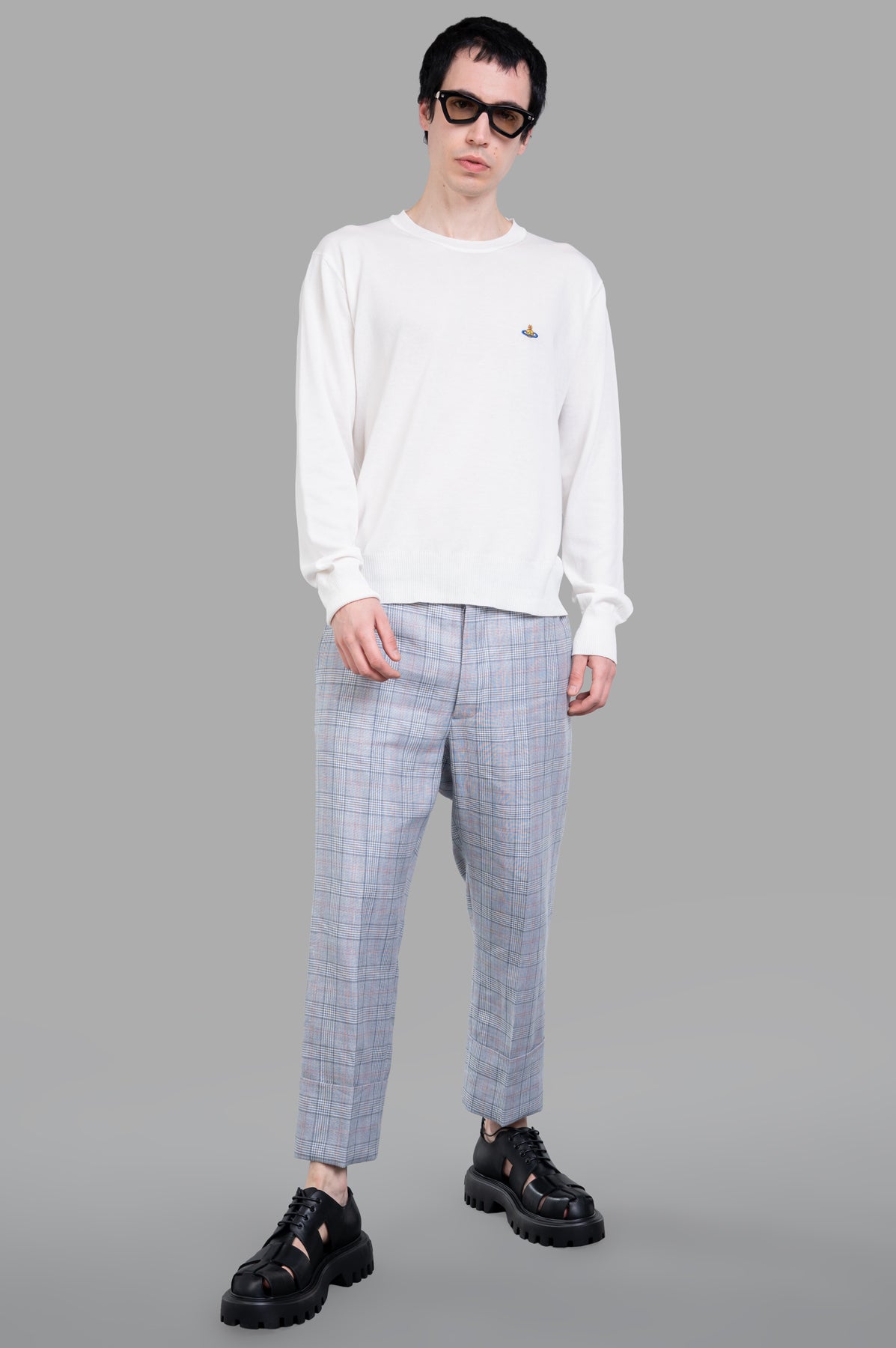 Vivienne Westwood Orb-embroidered Jumper on model, front view. White cotton with signature Orb logo on chest.