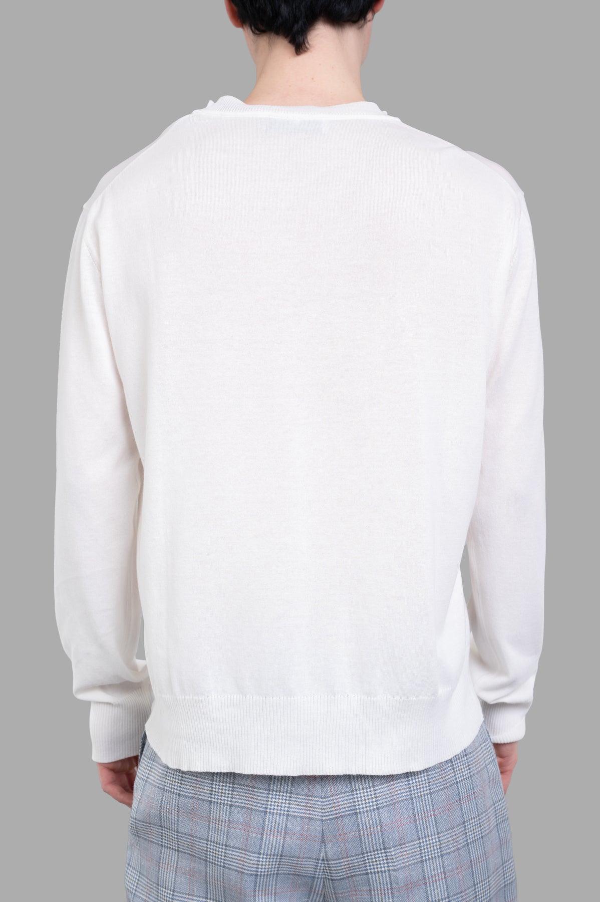 Vivienne Westwood Orb-embroidered Jumper, white knitted with ribbed edges, shown from the back on a model.