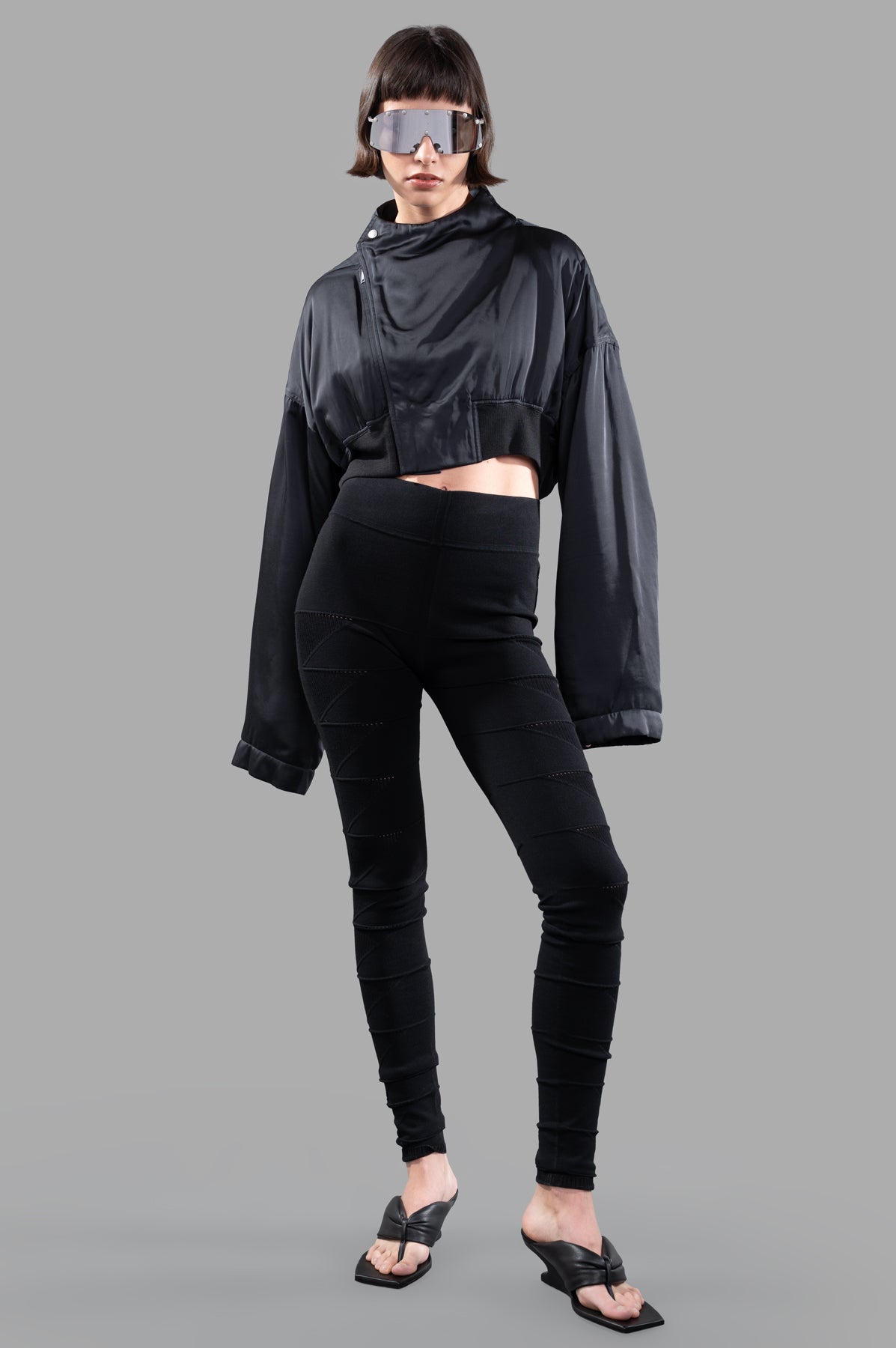 Rick Owens Anthem Flight Jacket, front view, on-model with oversized sleeves and cropped design in black.