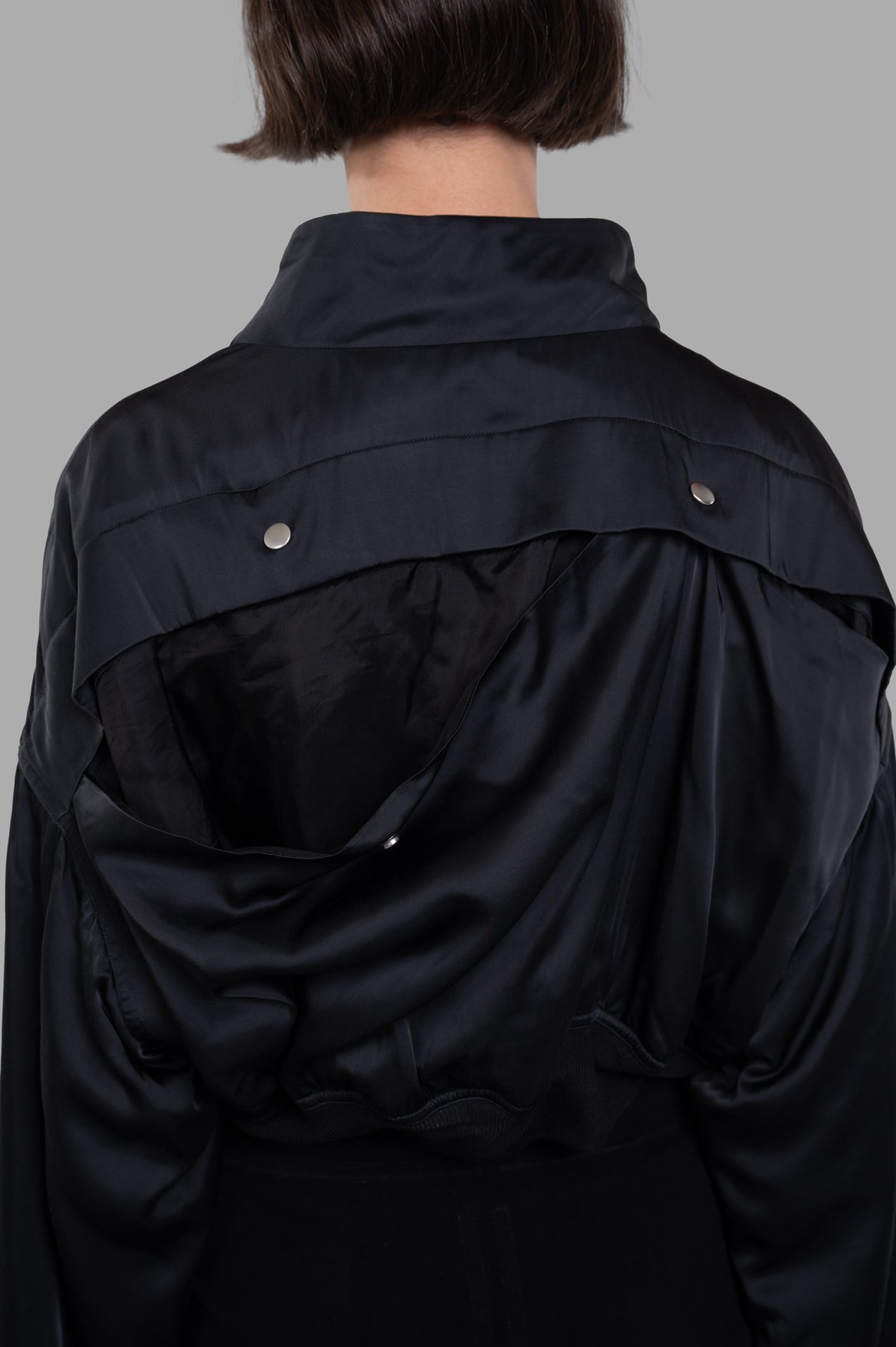 Rick Owens Anthem Flight Jacket featuring a unique open back design, showcased from the back on a model.