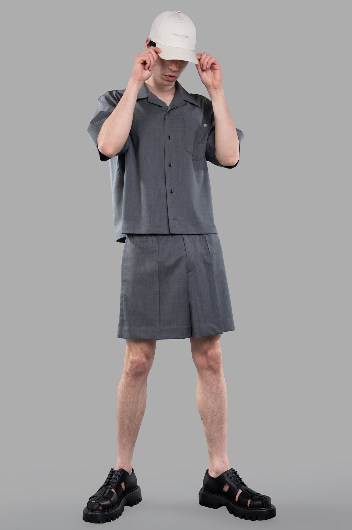 Helmut Lang Boxy Shirt, front view on-model, paired with matching shorts and black shoes.