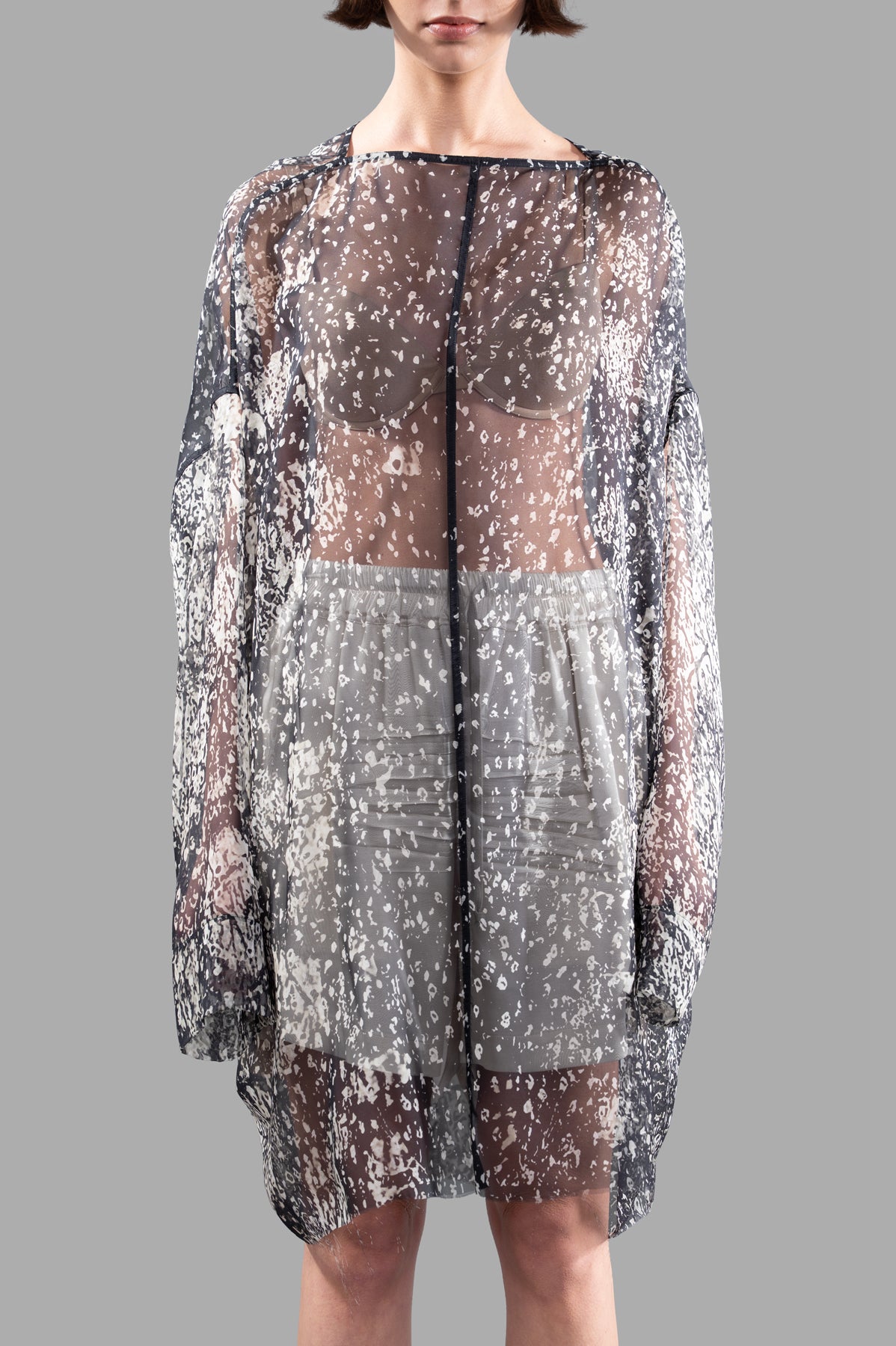 Rick Owens Transparent Tunic featuring a sheer black and white design, long sleeves, and a boat neckline, on a model.