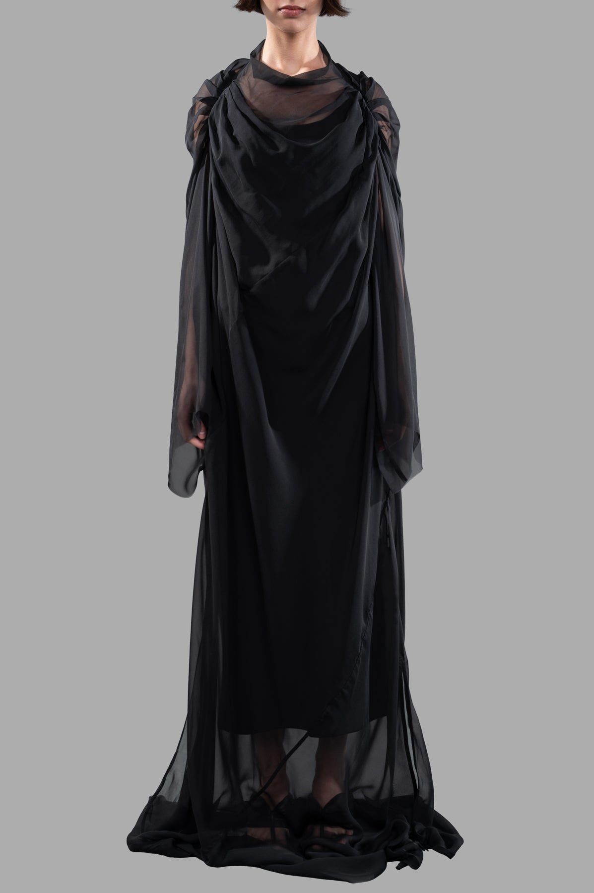 Rick Owens Draped Semi-Sheer Maxi Dress showcasing delicate ruching and draping, creating an elegant silhouette in black silk.
