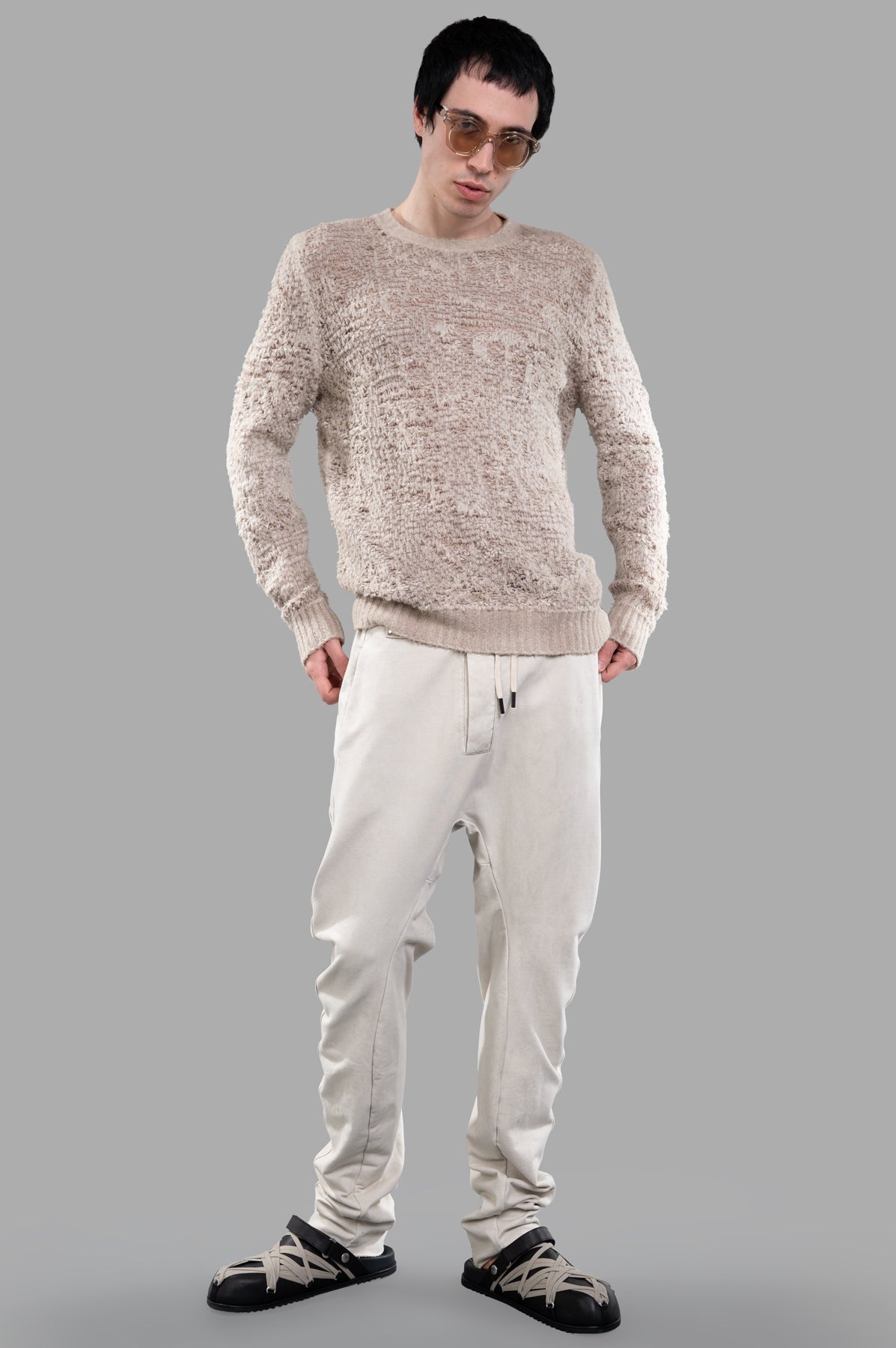 Masnada Drop-crotch Pants in Ecru, on-model, with elastic waist and drawstring for comfort, front view.