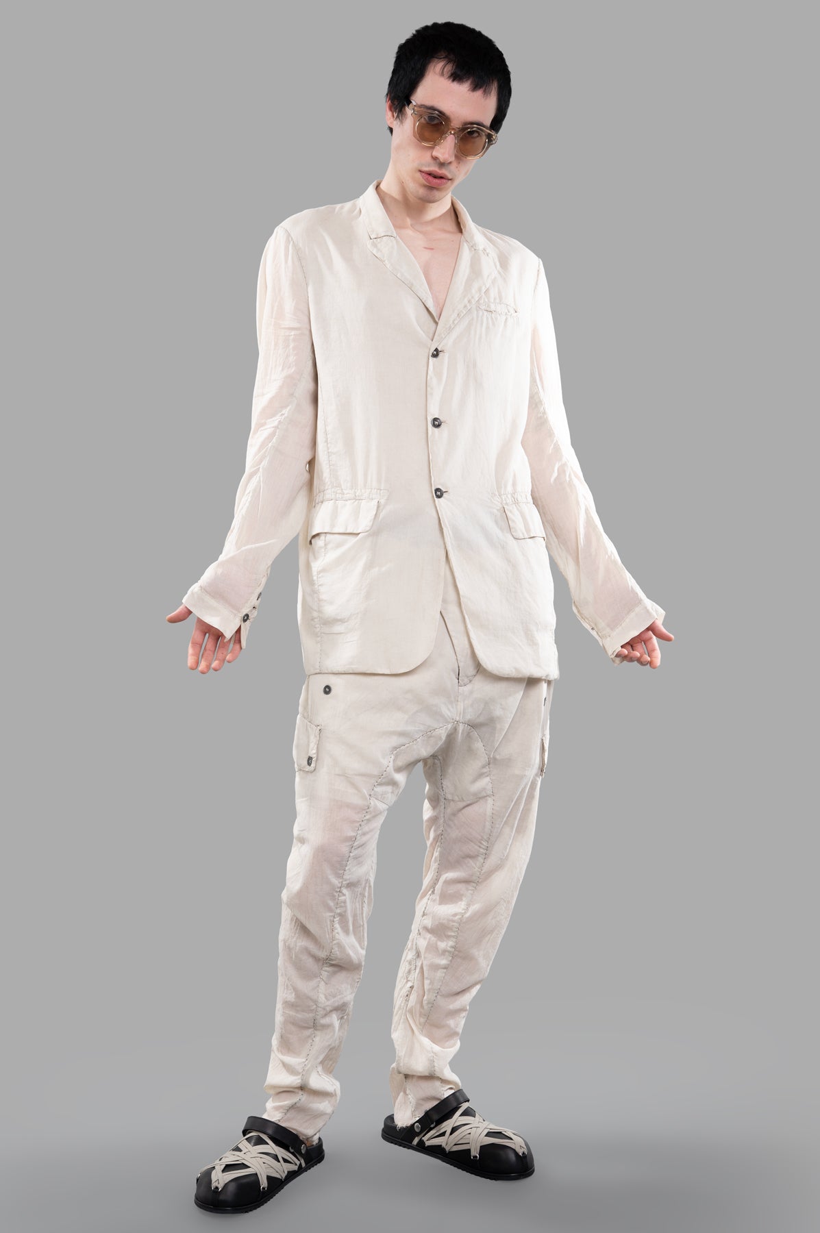 Masnada Single-breasted Lightweight Blazer on model, showcasing collarless design and side pockets, in ecru cotton.
