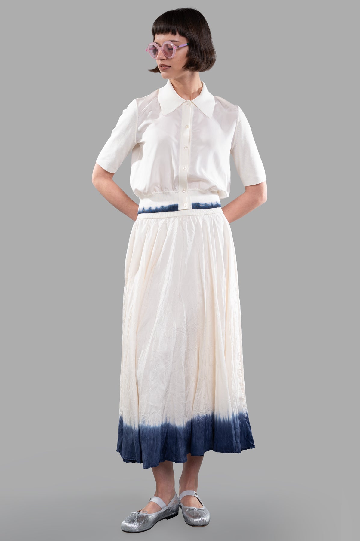 Joseph Gradient Skirt on-model, side view with tie-dye hem and elastic waistband, crafted from ecru silk.
